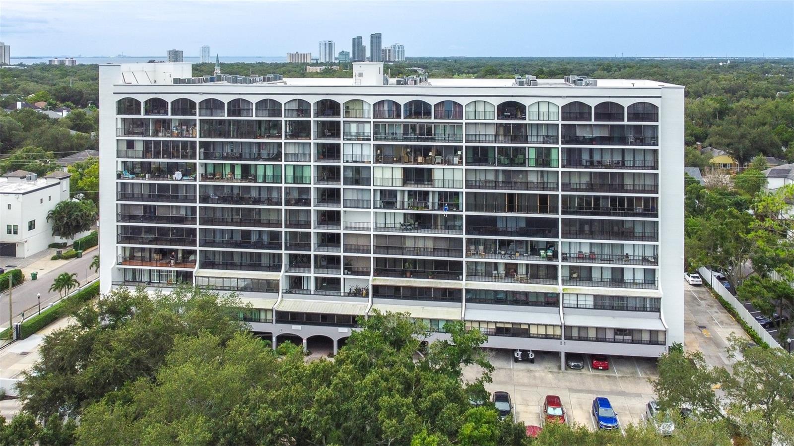 Seller Financing Available, and this unit can come furnished if desired! Welcome to Parkland Condominium, a gated community inthe heart of South Tampa. This beautifully updated 2-bedroom, 2-bathroom condo offers a comfortable Florida lifestyle with anopen-concept dining and living area that creates an inviting space for everyday living and entertaining.Step outside to enjoy the large private balcony with access from all bedrooms and living areas, perfect for morning coffee,relaxing, or entertaining guests. The primary bedroom features a built-in closet for convenient, organized storage. The condoalso includes updated finishes throughout, an in-unit washer and dryer, and a dedicated storage locker for additional space. Acovered assigned parking space near the entrance adds everyday convenience.Residents of Parkland enjoy a selection of community amenities, such as 24-hour gated security, including a pool with spa,fitness room, and sewer, trash and water included.The location is hard to beat, with easy access to Hyde Park, Downtown Tampa, Bayshore Boulevard, Tampa International Airport,premier restaurants and dining, shopping, entertainment, and Tampa's top sports and entertainment venues. Whether you'relooking for a full-time residence conveniently located in South Tampa, or second property for seasonal living, this condooffers an excellent combination of comfort, location, and lifestyle.Call for your private preview today!