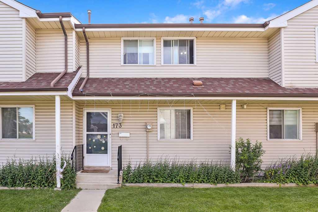 This home is a must see, located in a quiet complex in Falconridge, and only blocks from schools, shopping, transit routes and close to great amenities like Prairie Winds Park - perfect for your family! As you walk through the home you can sense the love and warmth it offers your family. The home was fully updated in 2016 including kitchen, floors, trim and doors, paint, appliances, bathrooms and basement development. Be welcomed into a generous foyer with included hall tree before falling in love with the rich wood cabinets, stone counters and stainless steel appliances (including newer fridge) surrounding a spacious dining area. Next find yourself in the large living room that can accommodate plenty of seating, and flowing out sliding patio doors to a your own private yard with pergola covered patio perfect for family fun or entertaining. The main floor also offers a 2 piece powder room for your guests. On the second floor you'll find the main 4 piece bathroom and two bedrooms for the kids, before you get lost in the spacious primary bedroom! In the basement, you'll find a large family room great as a play or entertainment room, a convenient 2 piece bathroom and another flex room perfect as an office, gym, hobby room or whatever works for you. The laundry room is there too, with newer washer and dryer. There is ample street parking in addition to your designated parking stall steps from the front entrance. Book your showing soon, this great home won't last long!