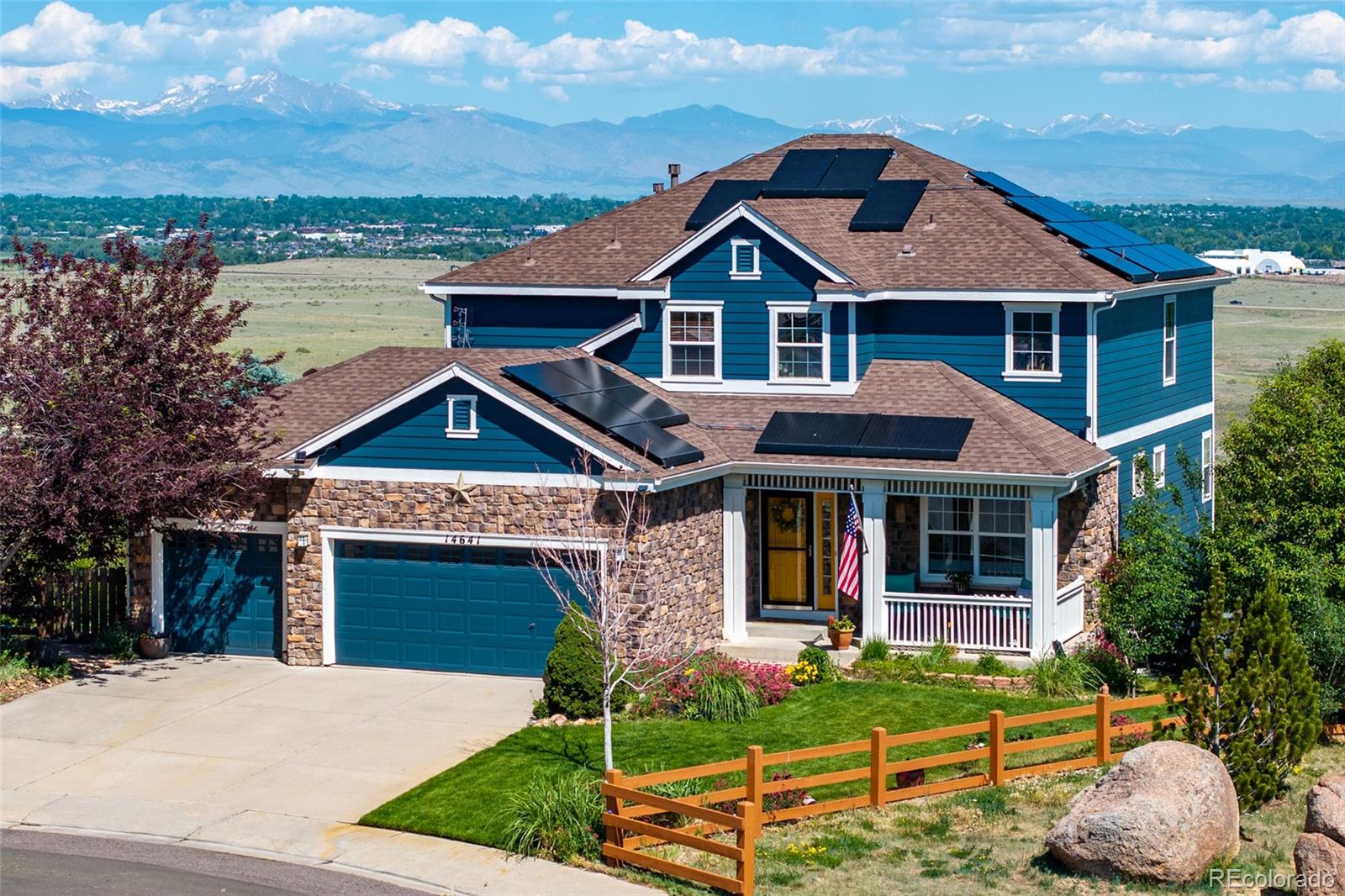 Experience Breathtaking Mountain Views From Almost Every Room in This Fabulous Cul-De-Sac Home Backing to Open Space, Siding to Trails, and Offering Panoramic Mountain and City Views. The Serene Setting Features an Oversized Mosaic Deck and a Peaceful Water Feature, Creating a Tranquil Atmosphere Showcasing Views of Longs Peak. This Stunning Property Offers Six Bedrooms, Four Baths, and a Main-Floor Bedroom or Office Supported by a Bonus Three-Quarter Bath. The Kitchen Features an Island, a Newer Gas Stove, and a Newer Refrigerator. The Upper Level Highlights a Primary Bedroom with a Five-Piece Bath and Jetted Tub, Alongside Three Additional Bedrooms and a Convenient Upper-Level Laundry Room. The Professionally Finished Walk-Out Basement Boasts a Family Room and Secondary Kitchen Set-Up with Quartz Counters and a Mini-Refrigerator, Plus Two Additional Flex Rooms or Offices and an Updated Bath Featuring an Oversized Shower, Quartz Counters, and a Ventless Washer/Dryer Combo. Additional Features Include an Owned Solar System, a Newer Roof, a Water Softener, a Newer Hot Water Heater, New Exterior and Fresh Interior Paint, New Carpeting, a Beautiful Water Feature, Diverse Fruit Trees, and Dedicated Garden Boxes. Outstanding Neighborhood Amenities Include a Community Pool, Clubhouse, and Tennis Courts.