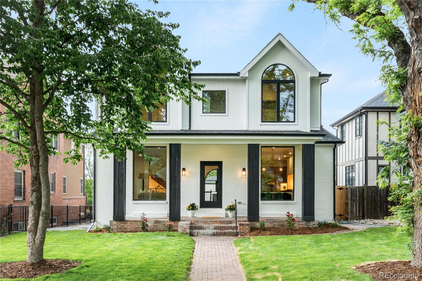 Thoughtfully rebuilt and designed for modern living, 43 Albion offers the rare opportunity to enjoy the feel of a new home within an established neighborhood setting. From the moment you step inside, you're welcomed by an abundance of natural light and a thoughtfully designed open concept floor plan. The dining area flows seamlessly into the heart of the home - a stunning chef's kitchen featuring an arched cooking alcove, Wolf gas range, farmhouse sink, expansive island, and a hidden walk-in pantry designed to keep everyday essentials tucked away while maintaining a clean, sophisticated aesthetic. Just beyond the kitchen, the spacious living room creates the perfect setting for both entertaining and everyday living. A covered deck directly off the kitchen creates a seamless extension of the living space, offering the perfect setting for outdoor dining, morning coffee, or evening gatherings while overlooking the spacious backyard below. A main-floor bedroom with a private en-suite bath and an additional powder bath complete the main level. Upstairs, the primary suite serves as a true retreat, complete with a soaking tub, oversized dual-head walk-in shower, dual vanities, and an expansive custom walk-in closet. Two additional upper-level bedrooms each feature private en-suite baths. The finished lower level expands the home's versatility with two additional bedrooms, a spacious secondary living area, and a bonus room ideal for a home theater, fitness studio, playroom, or creative workspace. Extensively renovated from top to bottom, this home offers the confidence of major improvements already completed, including a new foundation, new windows, new sewer line, and countless additional updates throughout. Complete with a detached two-car garage and convenient access to Cherry Creek, parks, dining, and local amenities, this is a rare opportunity to enjoy the character of an established neighborhood with the comfort and functionality of a home that lives like new.