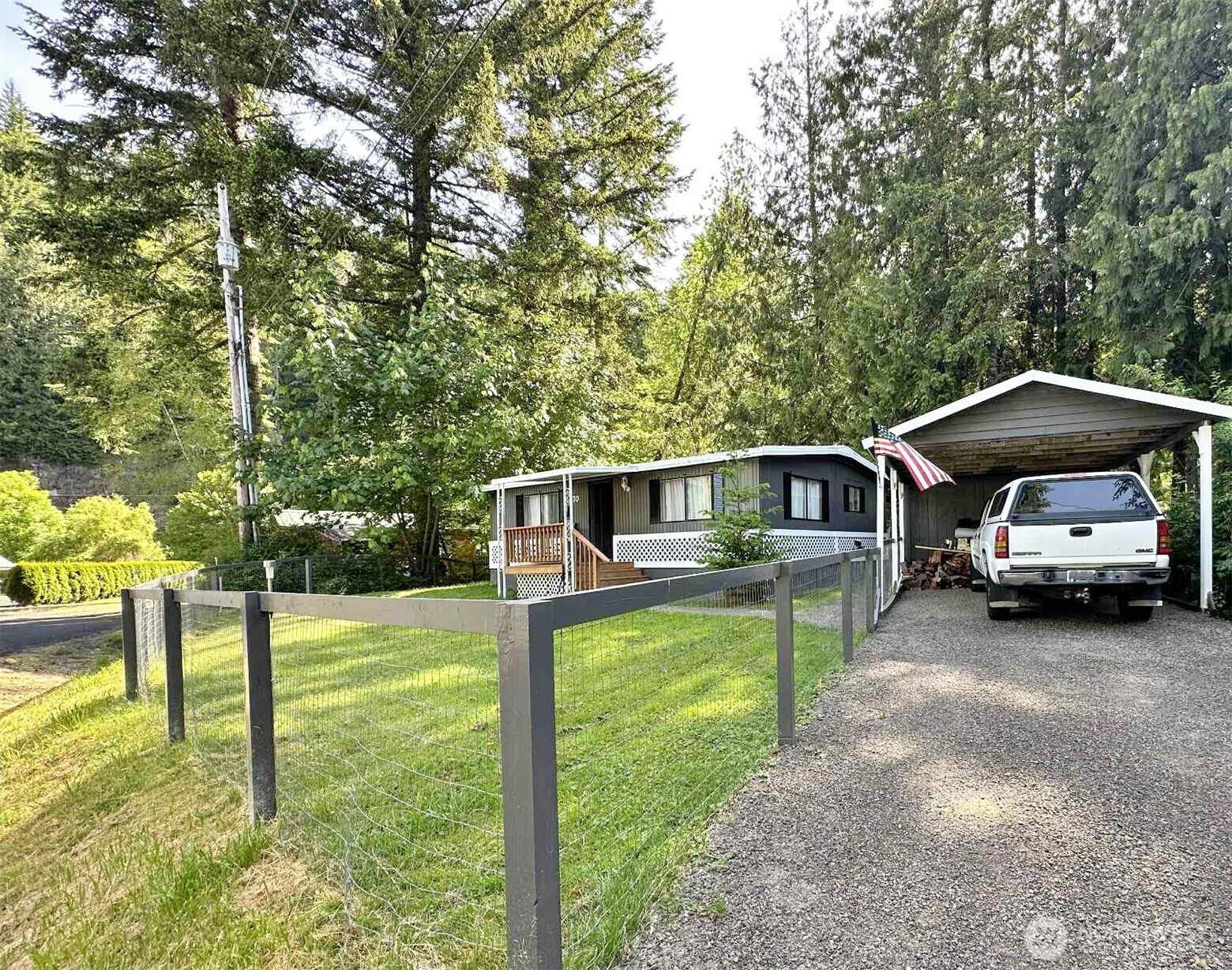 Enjoy private access to the river in this quiet little neighborhood.This house is in great condition along the Tilton River and nestled in the trees this 2 bed and 1 bath has been well maintained over the years, including new paint in and out, new kitchen, bath floors and carpet. Fully fenced with gravel driveway and walking paths around the house. Enjoy breathtaking views of the river, under a large, covered patio, big enough to entertain and relax as the river goes by or just hang out in the hammock. Well established bulkhead with steps makes it easy to get down to the water. You can even fish for salmon while you're relax on the river.