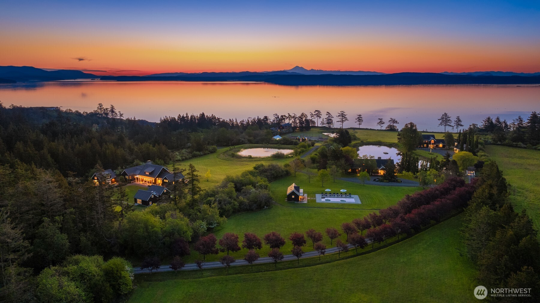 Welcome to Halftide Farms, a once-in-a-lifetime waterfront estate on San Juan Island boasting 90± acres, 650± ft of low-bank beachfront, two registered buoys & sweeping views of the Salish Sea & Mt. Baker. Never before offered to the public, properties of this magnitude, privacy & sophistication are rarely available in the PNW. Carefully curated with a nod to East Coast shingle-style beach houses, Halftide offers 3 luxury residences with guest cottages, bunk house, game house, tennis + pickleball courts, 2 pools, cabana, putting green, greenhouse, 4 ponds, caretaker house & more. Designed for gathering: sunny days spent boating, swimming, crabbing, fishing & enjoying charming Friday & Roche Harbors. A rare opportunity for a legacy estate.