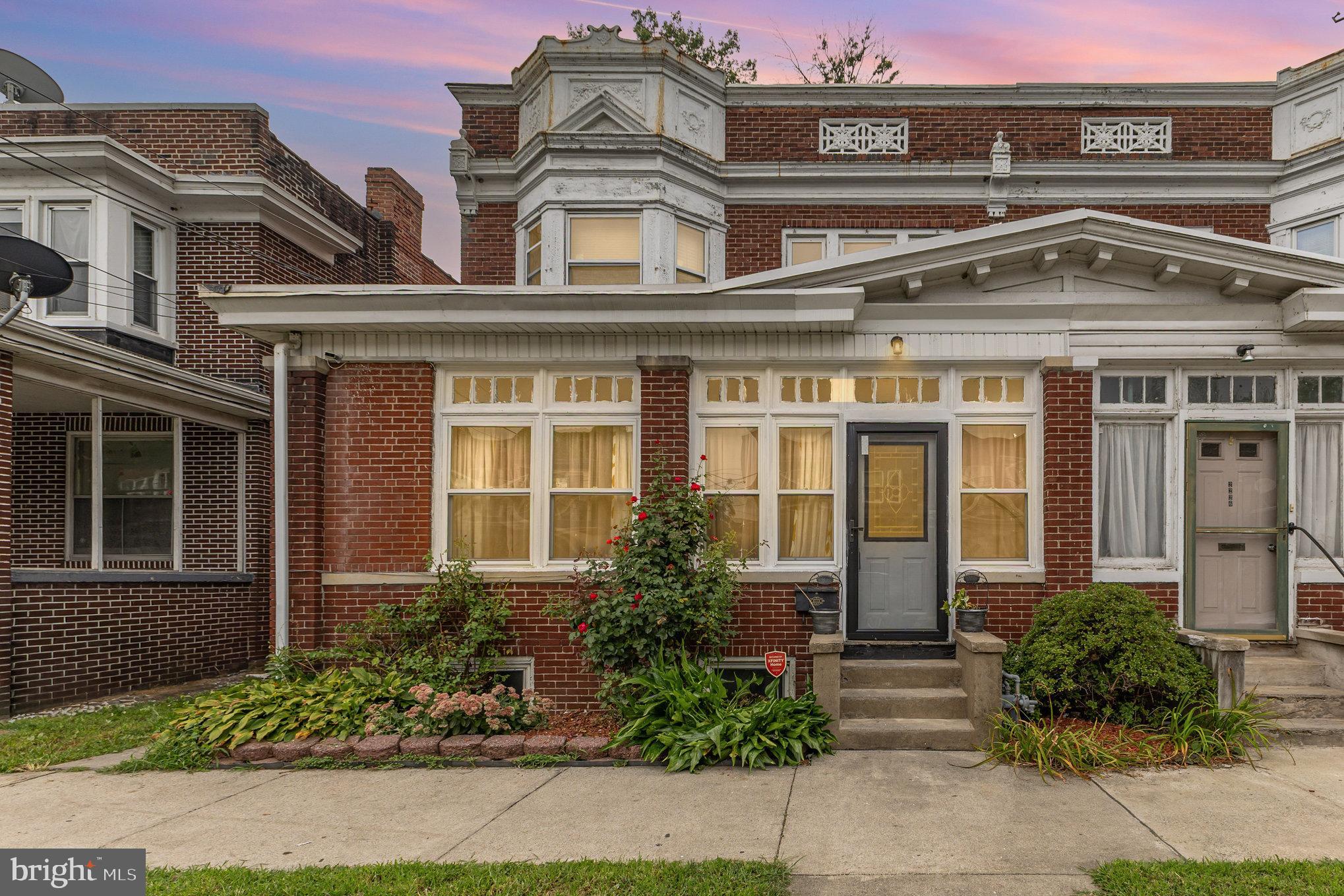 Nestled in the heart of the charming Midtown Historic District, this delightful twin home exudes character and warmth, inviting you to create lasting memories. Built in 1920, the brick façade tells a story of timeless elegance, while the cozy interior offers a blank canvas for your personal touch. Imagine evenings spent by the fireplace, where the flickering flames create a comforting ambiance. With 1,824 square feet of potential, this home is ready for your vision-whether you're looking to craft a serene retreat or a vibrant gathering space. The Midtown Historic District is more than just a location; it's a community that thrives on connection. Enjoy leisurely strolls through tree-lined streets, where neighbors greet each other with a smile. Local parks are just a stone's throw away, providing ample space for outdoor activities, picnics, and play. The community is rich with cultural events and farmer's markets, fostering a sense of belonging. Convenient public services and transportation options make daily life a breeze, allowing you to explore all that the area has to offer. This property is not just a house; it's an opportunity to embrace a lifestyle filled with community spirit and comfort. Don't miss your chance to make this charming residence your own!