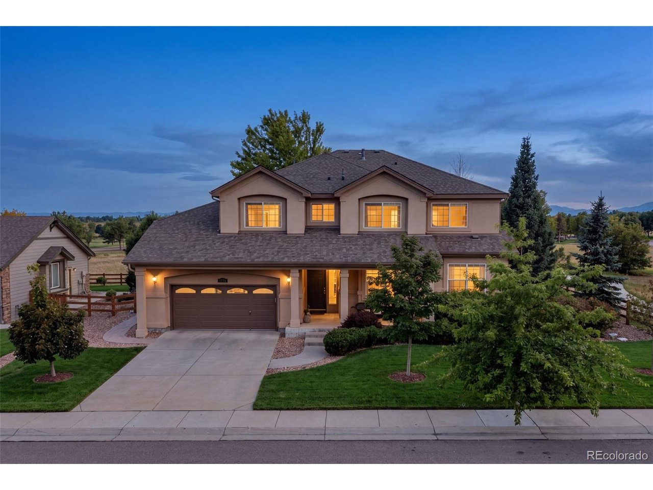 Situated in the coveted Redleaf neighborhood, this exceptional 5-bedroom residence enjoys a premier setting backing directly to Broomfield Commons, offering more than 300 acres of open space, sweeping mountain views, and stunning Denver skyline vistas. From the moment you arrive, the combination of sophisticated finishes, abundant natural light, and an inviting open-concept design creates an elevated yet comfortable atmosphere. The beautifully appointed kitchen features extensive cabinetry, generous prep space, a bright dining area, and seamless connection to the formal dining room, making it equally suited for everyday living and entertaining. A main-level bedroom and full bathroom offer ideal flexibility for guests, a private office, or multigenerational living. Upstairs, the expansive primary suite provides a private sitting area, two oversized walk-in closets with custom organizers, and a luxurious en-suite bath with soaking tub and separate shower. Three additional bedrooms and two bathrooms complete the upper level. The unfinished basement offers impressive ceiling height and endless potential for a home theater, gym, recreation space, or additional living area. Step outside to a private, fully fenced yard with mature landscaping and direct open-space access. Adding tremendous value, the owned and fully paid-off solar panel system conveys with the home, offering the next owner the opportunity for significant energy savings with no remaining solar balance. The existing VA mortgage may also be assumable at an exceptional 2.75% interest rate for a buyer who qualifies, subject to lender and VA approval; assumption is not guaranteed. The roof will be replaced at closing, and a whole-home warranty covering mechanical systems and appliances provides additional peace of mind. Ideally located near the Paul Derda Recreation Center, parks, trails, and everyday amenities, this is a rare opportunity to own an exceptional home in one of Broomfield's most desirable settings.