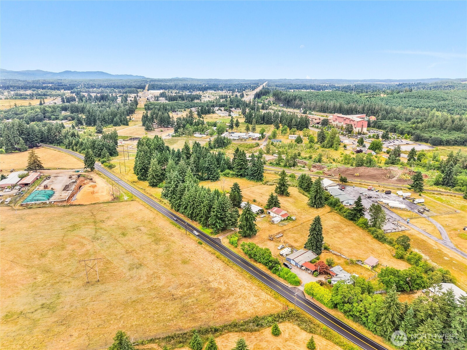 Prime Planned Industrial Development Opportunity – 9.4 Acres | Rail-Served | I-5 Access Unlock the potential of this rare Planned Industrial-zoned property comprising three parcels totaling 9.4 acres, strategically located just minutes from Interstate 5 with direct rail service access—ideal for logistics, warehousing, manufacturing, or distribution. This property offers a unique blend of industrial functionality and existing residential infrastructure with two on-site residences, perfect for live/work arrangements, site management, or transitional use. The flat, usable land and excellent transportation connectivity make this an outstanding investment or owner-user opportunity.