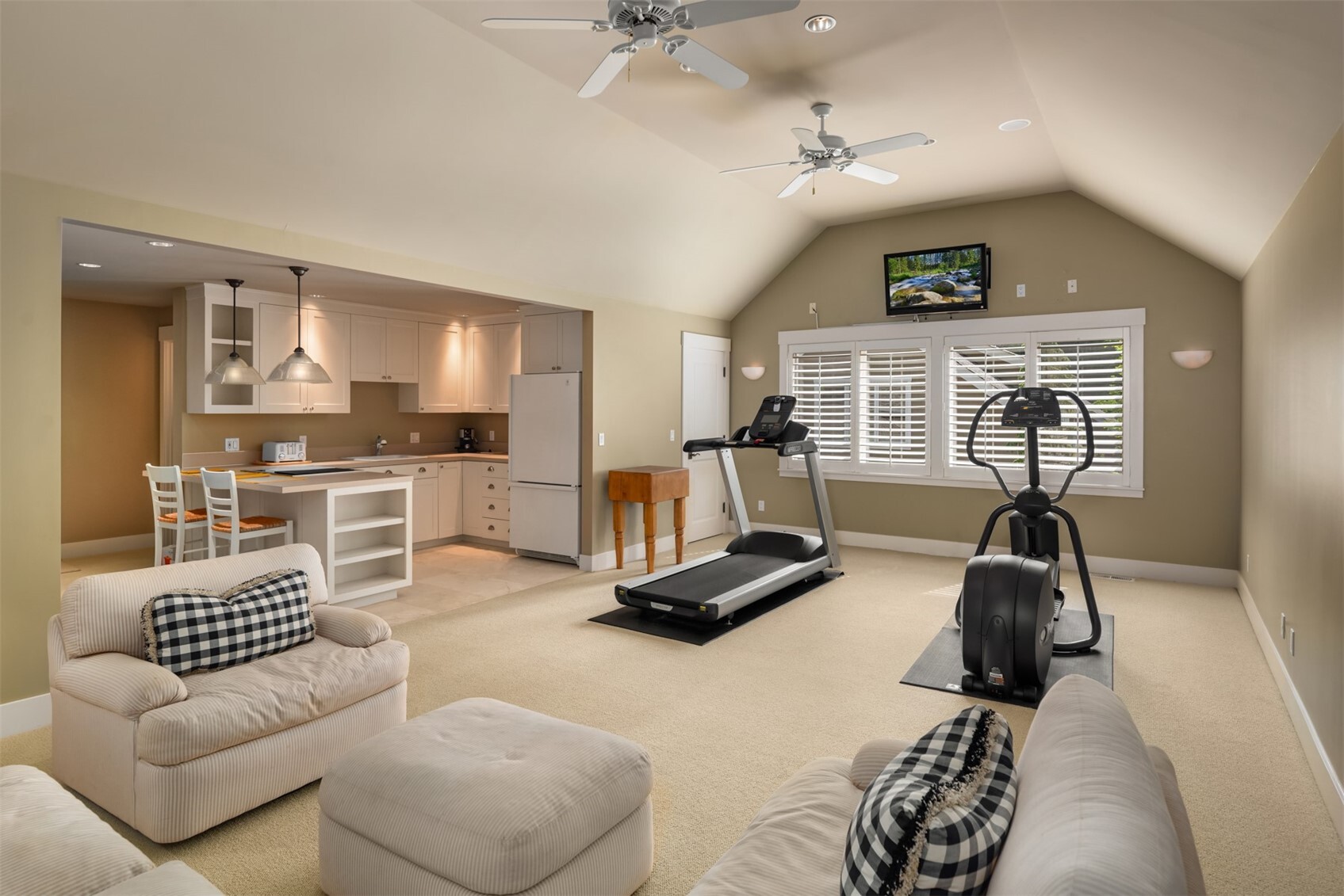 Bonus room with exercise equipment and kitchenette