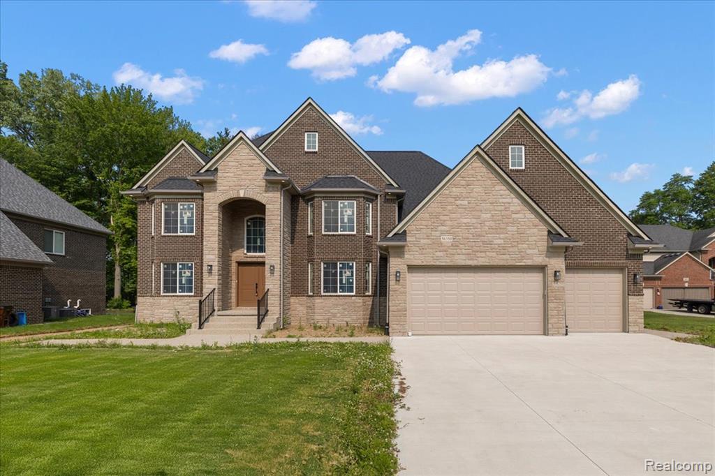 *NEW CONSTRUCTION* Welcome to this Elegant, New Build Colonial perfect for Multi-Generational Living.  This home offers over-the-top space, function, and modern finishes throughout. Step into a Grand Two-Story Foyer that opens to a Spacious Great Room with bow windows and a sleek fireplace—ideal for both everyday living and entertaining. 

The Gourmet Kitchen features quartz countertops, premium cabinetry, an oversized island that can provide additional seating. A BONUS Prep Kitchen with countertops, sink, storage, and space for a second oven and dishwasher. This home boasts 7 bedrooms and 7 bathrooms, including two first-floor en-suites, each with walk-in closets and luxury baths. 

Upstairs, you'll find five more bedrooms, four of which are en-suites, all with generous walk-in closets. Premium flooring, designer finishes, and a modern open floor plan tie the home together. Additional highlights include: First-floor laundry, Fully insulated basement ready to finish as a gym, media room, or additional living space, Private backyard with patio. **BUILDER INCENTIVE Includes Sod** Located just minutes from shopping, dining, and entertainment. 

Newly Constructed with Exceptional Craftsmanship and Expansive Living—this is a rare chance to own a home of this Standard & Quality!