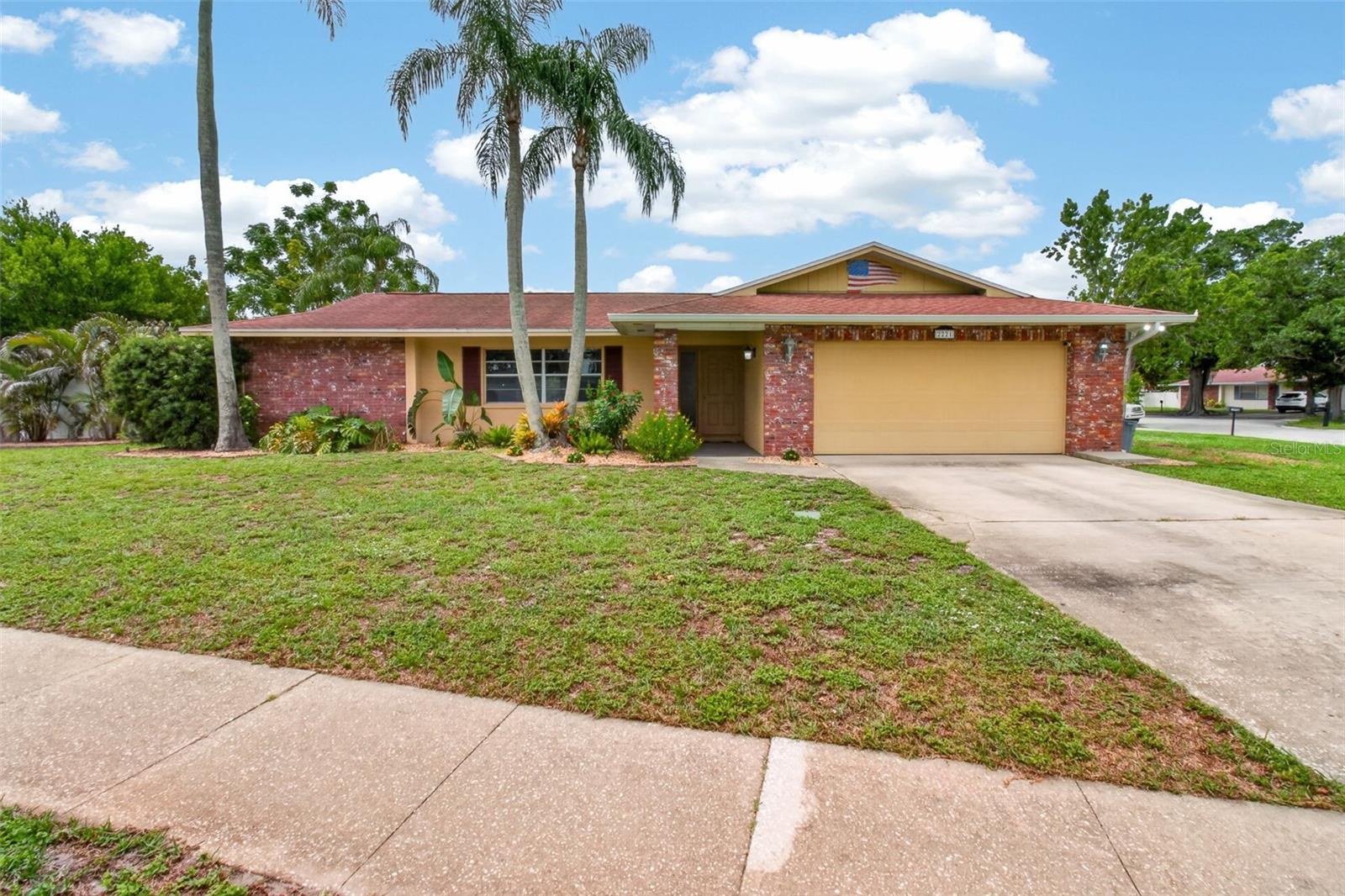 Welcome to your own private tropical paradise in one of Dunedin's most desirable locations! This beautifully maintained 3-bedroom, 2-bath pool home sits on a spacious corner lot in Flood Zone X with NO mandatory HOA, offering peace of mind and the freedom to truly enjoy Florida living.  Inside, you'll find gorgeous flooring, an open and inviting layout, new stainless steel kitchen appliances, a whole-house water softener, and a reverse osmosis drinking water system in the kitchen.  Comfort and efficiency are unmatched with the top-of-the-line Japanese-designed 5-zone HVAC system, allowing each room to have its own individual temperature control for personalized comfort. The home also features newer solar panels that dramatically reduces monthly electric bills for years to come. The solar loan will transfer to the new owner, allowing them to continue enjoying the energy savings.  Step outside into your own private tropical oasis! The fully fenced backyard is designed for entertaining and relaxation with lush tropical landscaping, a sparkling pool featuring a new pool pump and filter, a spacious screened lanai, tiki bar, outdoor grilling area, and exceptional privacy. Whether you're hosting friends or enjoying a quiet evening under the palms, this backyard truly feels like your own resort.  Located just minutes from everything that makes Dunedin one of Tampa Bay's most sought-after communities:Just minutes to the award-winning beaches of Honeymoon Island State Park and Caladesi Island State ParkClose to the vibrant Downtown Dunedin with its waterfront parks, restaurants, breweries, boutiques, festivals, and marinaEasy access to the Pinellas Trail for walking and bikingApproximately 20 minutes to Clearwater BeachApproximately 30 minutes to Tampa International AirportConvenient to shopping, medical facilities, golf courses, and everyday conveniencesThis home offers the perfect combination of comfort, energy efficiency, privacy, and an unbeatable location. Whether you're looking for a full-time residence, vacation home, or investment opportunity, this Florida oasis is ready for you to move in and start enjoying the lifestyle you've been dreaming about.