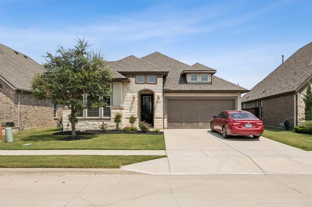 Step into this beautifully appointed 3-bedroom, 2-bathroom home in the sought-after Berkshire community of Fort Worth. Designed with an open-concept layout, this residence offers both comfort and modern style. The main living areas showcase rich wood plank flooring, while bedrooms provide plush carpet and bathrooms feature wood-grain ceramic tile for a refined finish. The kitchen is a true centerpiece with granite countertops, both a peninsula and island, stainless steel appliances, a farmhouse sink, and recessed lighting that flows into the dining and living areas. The inviting living room is anchored by a stunning stone-faced fireplace—perfect for entertaining or relaxing evenings. The private primary suite boasts a walk-in closet, double vanity, separate shower, and garden tub for unwinding. Additional highlights include a tankless water heater, a mudroom off the garage entry, utility closet with full-sized washer-dryer connections and cabinets, and a covered patio overlooking the backyard. Berkshire residents enjoy resort-style amenities, including a sparkling pool, clubhouse with rentable event space, playground, catch-and-release fishing pond, and scenic bike trails. Located in Northwest ISD with easy access to Hwy 287 and I-35W, the home is just minutes from Alliance Town Center, Presidio Towne Crossing, the historic Fort Worth Stockyards, Eagle Mountain Lake, and downtown Fort Worth. This home seamlessly blends thoughtful design, modern upgrades, and an unbeatable location—ready to welcome its next owners.