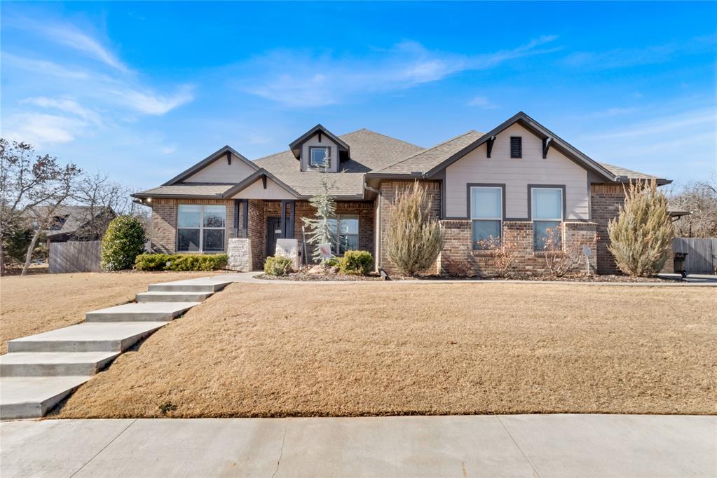 Beautifully designed 4-bedroom, 2.5-bath home offering over 2,300 sq ft of spacious living on 1.36 acres. Features include an inviting front porch, grand windows, and a three-car garage. The open floor plan flows from a formal dining area into a large living space with a cozy corner fireplace. The kitchen offers a large island, walk-in pantry, and breakfast nook overlooking the living area. The private primary suite includes high ceilings, dual vanities, soaking tub, separate shower, and an oversized walk-in closet. Two secondary bedrooms share a full bath, with an additional flex space ideal for a study or fourth bedroom. Above-ground storm shelter included for added safety and peace of mind.