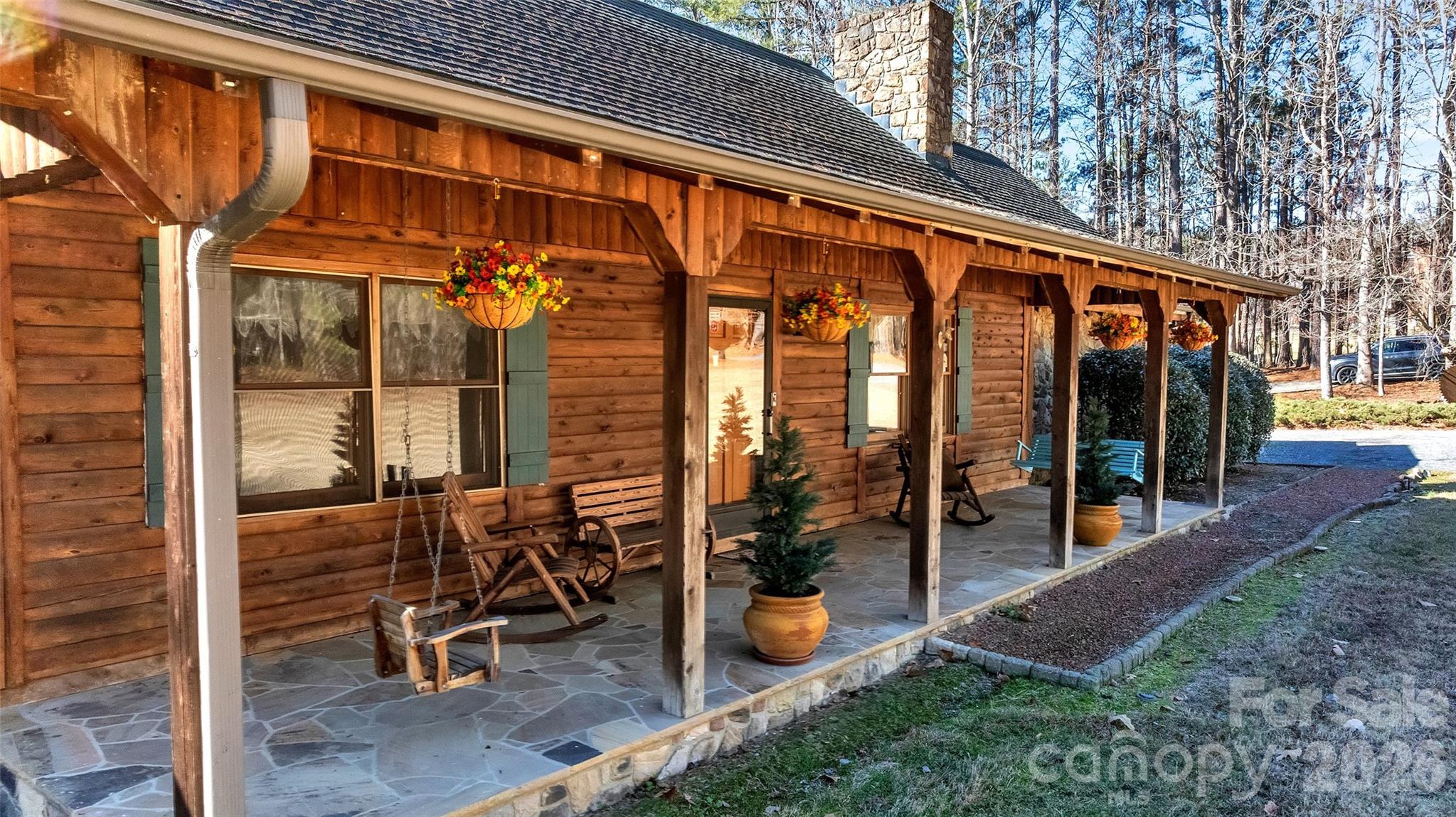 Private Log Cabin Retreat on Nearly 10 Acres – Minutes from TownEscape to the perfect blend of privacy and convenience with this stunning log cabin set on almost 10 acres of scenic land. Surrounded by nature and featuring a private walking trail, this property offers a peaceful retreat while remaining just minutes from town amenities.Inside, the home showcases 3 bedrooms + bonus, 3 bath with a dramatic vaulted ceiling and a striking rock fireplace that anchors the main living space, creating a warm and inviting atmosphere. The layout enhances the cabin’s rustic charm while allowing for comfortable everyday living and entertaining.The finished basement provides valuable additional living space, ideal for a family room, guest suite or recreation area. Step outside to enjoy both a covered and open back deck perfect for relaxing, hosting gatherings or taking in the serene wooded views.Adding exceptional versatility is the 30x40 Quonset steel building, ideal for storage, a workshop, or hobby space. Additional storage options in the 3 bay shed and wood sided building. This unique property delivers the rare combination of seclusion and convenience, offering privacy without sacrificing proximity to town. Whether you’re searching for a full-time residence or a peaceful retreat, this log cabin is a must-see. Schedule your private showing today.