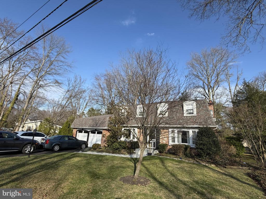 Tucked into the heart of the enchanting Medford Lakes community, this classic center-hall Dutch Colonial offers timeless character, generous living spaces, and the rare opportunity to own a home filled with decades of cherished memories. Beautifully positioned on a large wooded parcel between Kihade Trail and Narragansett Trail, the setting feels peaceful and private — yet connected to one of South Jersey’s most beloved lake communities.Custom built by the Bricketto Family and lovingly maintained by one long-time Laker family since 1971, this spacious residence offers approximately 2,790 square feet of comfortable living. The home’s traditional layout provides an ideal blend of formal and casual spaces designed for gathering, entertaining, and everyday enjoyment.A welcoming center foyer opens to bright and inviting living and dining rooms, while the large kitchen flows naturally into the warm and comfortable family room featuring a beautiful brick wood-burning fireplace — the perfect backdrop for cozy evenings and seasonal celebrations. One of the home’s most special features is the oversized screened porch, where you can unwind with morning coffee, host summer dinners, or simply enjoy the peaceful views of the surrounding trees and nature.Upstairs, four generously sized bedrooms offer flexibility for family, guests, or home office needs. The private primary suite provides abundant closet space and its own bathroom with walk-in shower, creating a quiet retreat at the end of the day.Thoughtful updates including a newer roof, gas cooktop, newer appliances, gas water heater, brand-new heat pump, and sump pump add important comfort and peace of mind for the next owner.Life in Medford Lakes is truly a lifestyle. Residents enjoy access to scenic swimming lakes, sandy beaches, canoeing, fishing, nature trails, and a vibrant sense of community with year-round events and traditions. Surrounded by towering pines and natural beauty, yet conveniently located near shopping, dining, and major commuter routes, this home offers the perfect balance of tranquility and accessibility.A rare opportunity to become part of the Medford Lakes story — and begin creating your own. #lovewhereyoulive   #thelakerlifeforme(Professional photos coming on Friday :-0) )