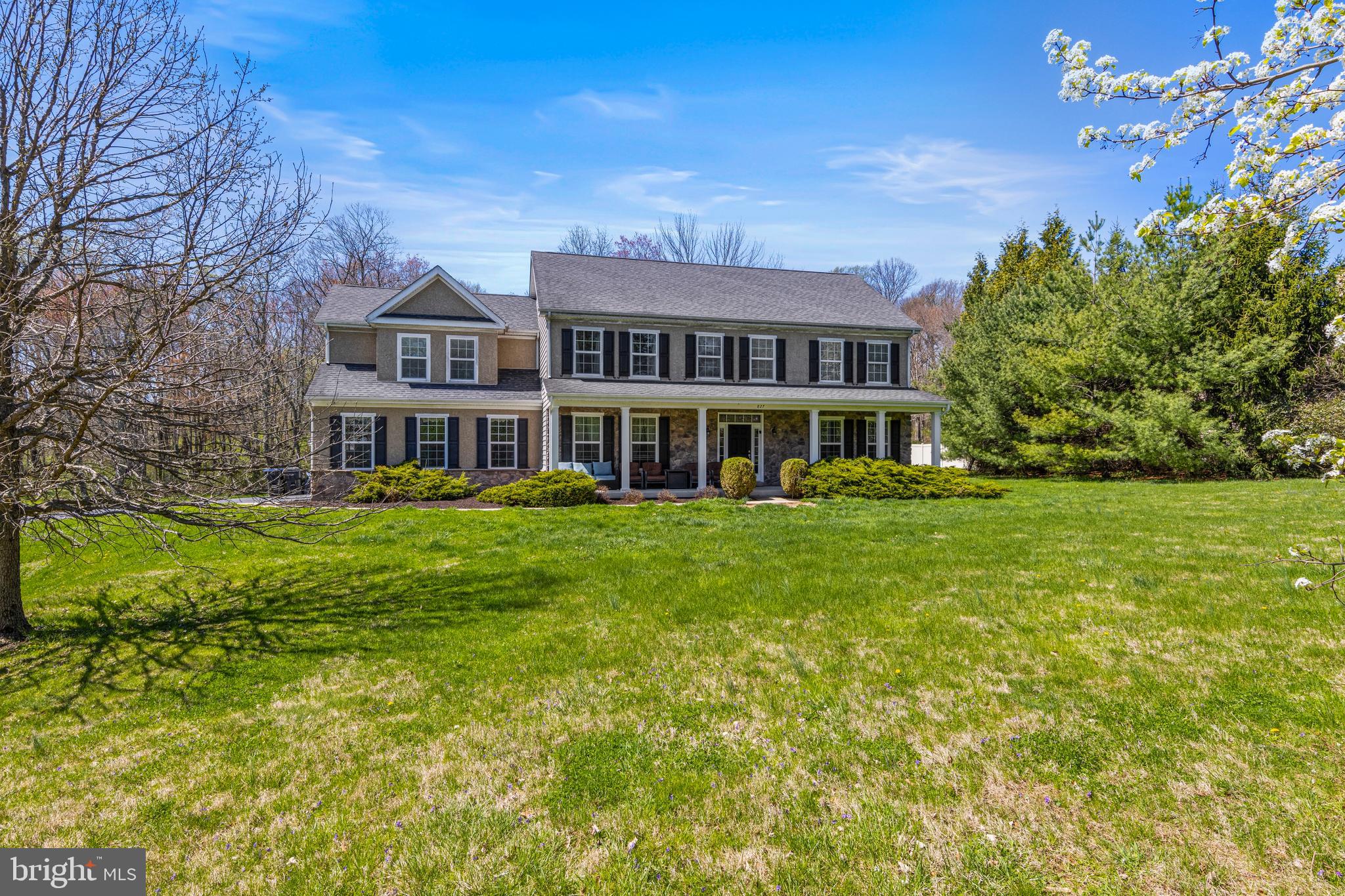 Welcome to 827 Oak Tree Road—an exceptional custom-built home set on a private and picturesque 4.85-acre lot, just moments from the award-winning Unionville-Chadds Ford School District, including the middle and high schools.  Built in 2012 and offering over 3,300 square feet of thoughtfully designed living space, this home combines timeless elegance with modern comfort. A charming covered front porch welcomes you into a dramatic two-story foyer, highlighted by gleaming hardwood floors and a striking turned staircase. The foyer is gracefully flanked by formal living and dining rooms—perfect for both everyday living and entertaining.  At the heart of the home, the bright and inviting kitchen features a large center island and a sun-filled breakfast room overlooking the serene, park-like grounds. The kitchen flows seamlessly into the expansive family room, complete with a cozy gas fireplace—creating the ideal space for gathering.  Upstairs, the luxurious primary suite offers a peaceful retreat with a tray ceiling, a spacious walk-in closet, and a spa-inspired bath featuring dual vanities, a walk-in shower, and a soaking tub. Four additional generously sized bedrooms provide ample space for family and guests, along with a well-appointed hall bath.  The unfinished lower level offers endless possibilities for customization to suit your needs.  Outdoors, the property truly shines. Nearly five acres of rolling landscape include a tranquil pond, open meadows, and scenic trails leading into the woods—perfect for enjoying nature right at home.  All of this, just under a minute from UCFSD schools and the vibrant shops and dining of Kennett Square.