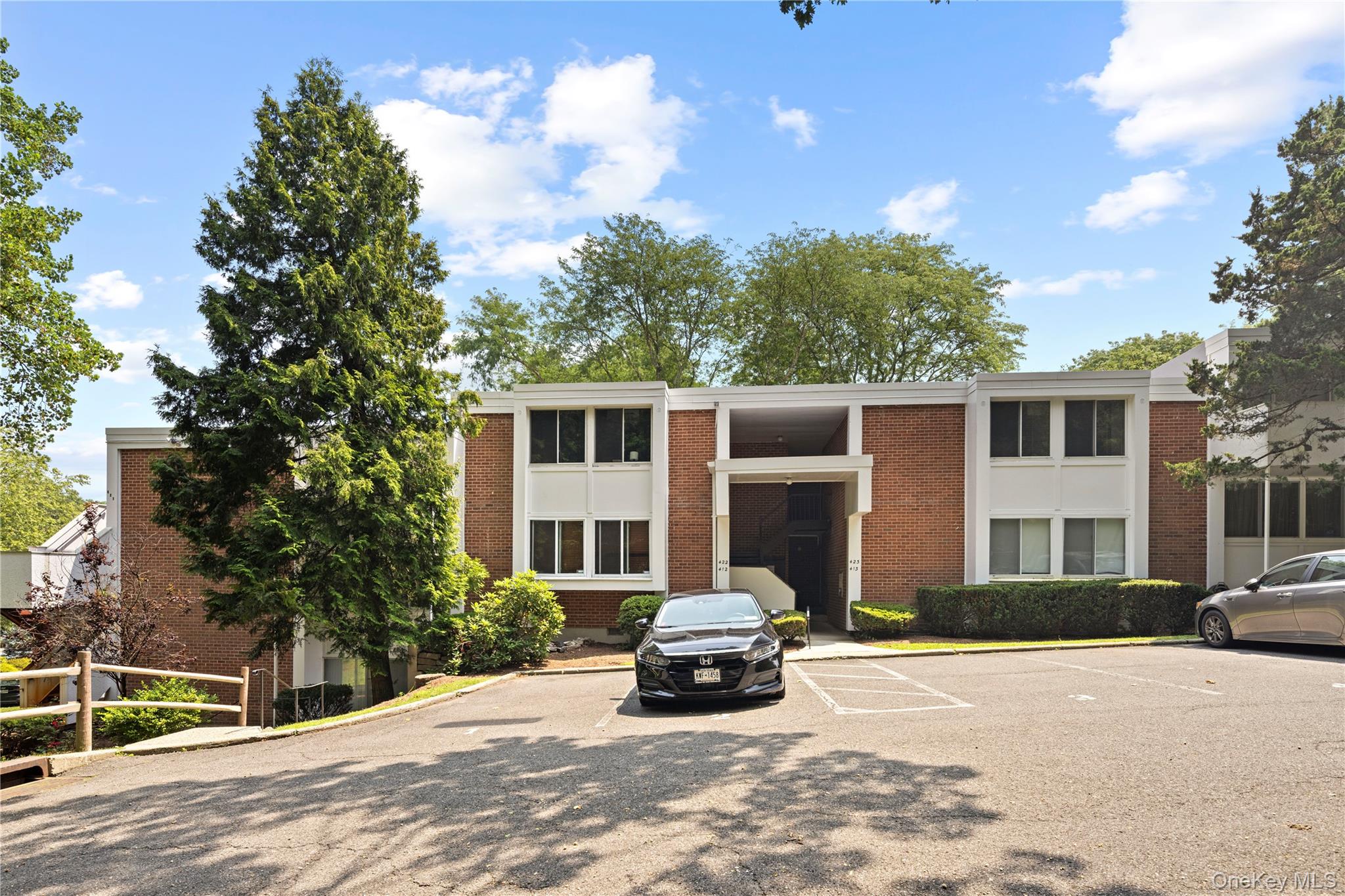 Welcome to 423 Colony Drive in Hartsdale, New York.  This beautifully maintained 2-bedroom, 2-bath top-floor condo in the sought after Colony Condo Complex might be just what you've been waiting for.  This bright & spacious unit is in move-in condition.  Just unpack and start enjoying your new home.  You are welcomed by a large living room, then step into the dining area which has sliders to a balcony - perfect for morning coffee or evening relaxation.  The modern kitchen boasts modern appliances, ample cabinet & countertop space and a functional layout for easy entertaining.  The generously sized primary bedroom includes an en-suite bath and great closet space while the second bedroom is perfect for family, guests, a home office, or both.  Enjoy the ease of top-floor living with no one above you and plenty of natural light throughout.  The unit comes with 2 unassigned parking spaces and the complex offers a private pool.  You couldn't ask for a more convenient location, minutes to White Plains or Hartsdale, you have 2 train stations to choose from and the area offers great shopping and dining choices.  Don't miss out on this great opportunity to own your own home and be in by fall!  Please verify all info.