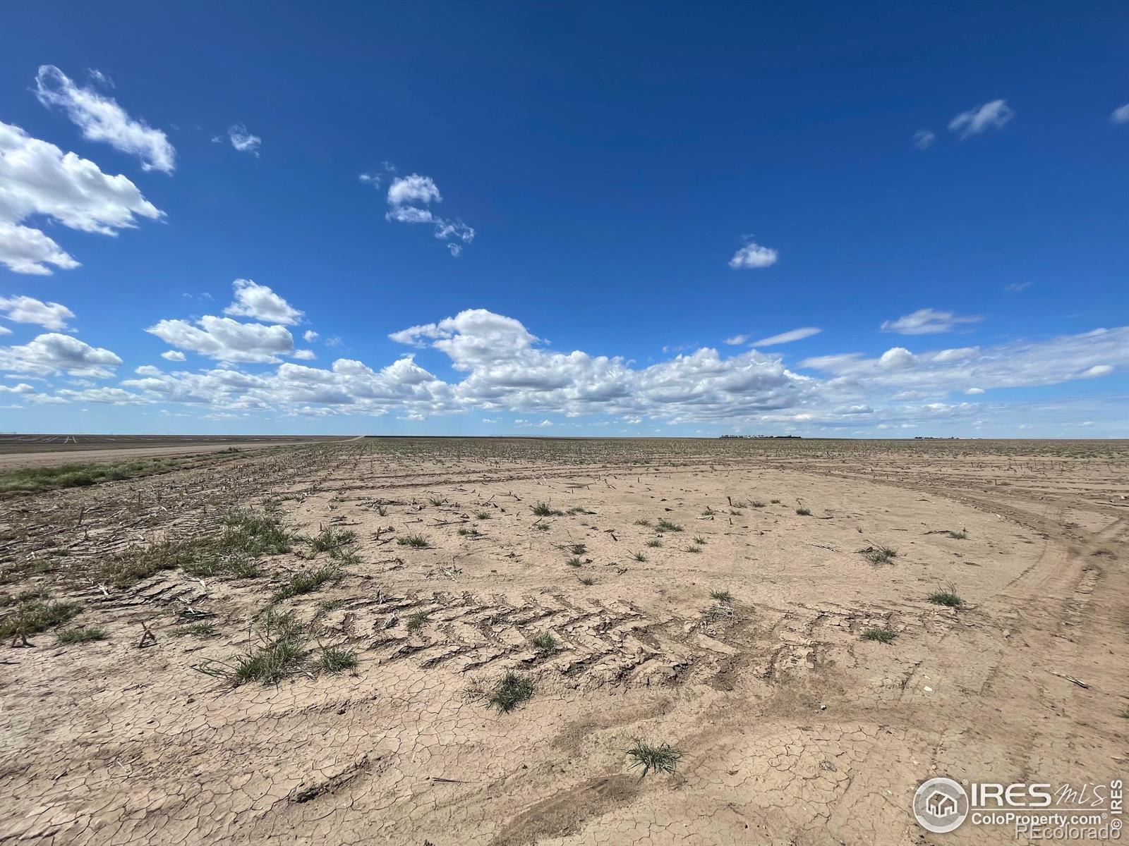 Located Southeast of Burlington, CO at Roads 55 & L. Sec 13- Township 10 - Range 43 West. Property Description: 271.87 AC +/- Dryland broken down into 195.31 CRP acres and 67.73 Dryland acres. The CRP contract is $38.18 per acre and expires in 2031. Soils are mostly class III-IV. There is a new transmission line running along the north edge. It is easily accessed by maintained county roads.
