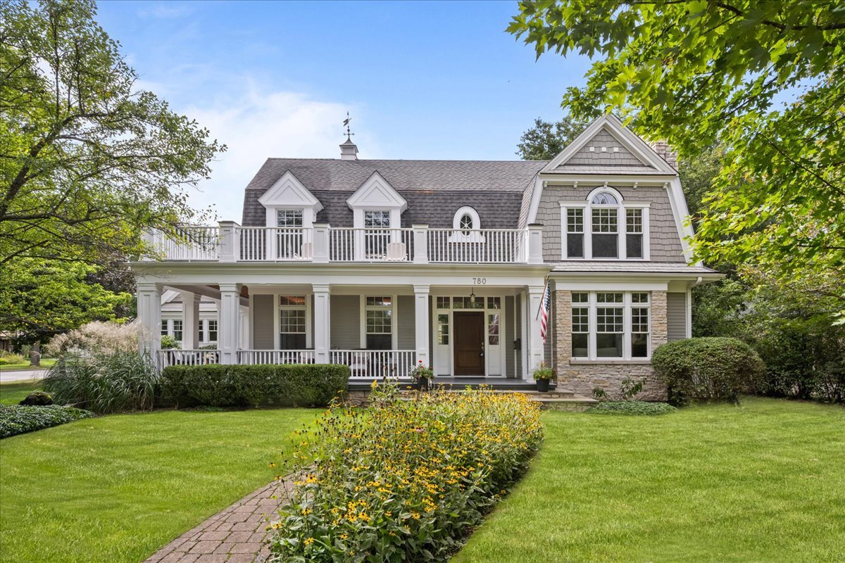 Blending comfortable living across five levels with everyday convenience, this custom-built "New Traditional" residence is situated across from the 15th hole of Skokie Country Club's golf course. Set upon nearly half an acre, the home combines quality craftsmanship, award-winning design, generous living spaces and a convenient Glencoe location close to schools, town, recreation, and transportation.  This custom-built Glencoe residence was designed with both gathering and privacy in mind. Pella windows fill the home with natural light, highlighting hardwood floors, detailed millwork and thoughtfully finished interiors. The spacious family room with a stone fireplace overlooks the backyard, while the living and dining rooms enjoy views of the golf course.    A thoughtfully positioned mezzanine office easily accommodates two workspaces and overlooks the main floor, making it possible to work apart from the house's activity while still remaining connected. A separate loft, located a half-floor above the bedroom level, provides additional space for reading, television, homework or casual gatherings.    Four spacious en-suite bedrooms each include a walk-in closet, and two of the bedrooms open to private balconies. A fifth bedroom suite in the finished lower level provides additional flexibility for guests or other uses.    The lower level significantly expands the home's recreational space. Heated floors run beneath an open recreation area with room for television viewing, exercise and a bar, along with enough space for pool, ping-pong, gaming or a combination of activities.    Just steps from scenic bike and walking trails, 780 Prairie offers easy access to downtown Glencoe, Glencoe Beach, the Skokie Lagoons, Chicago Botanic Garden and Ravinia Festival. This well-designed home offers substantial space, flexibility and a location that makes it easy to enjoy much of what the North Shore has to offer.