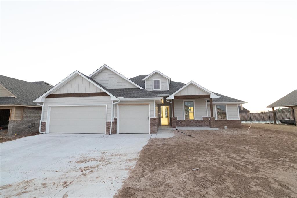 The Hazel floor plan has a total of 2,095 Sqft for living space, including 1,900 Sqft of indoor living and 220 Sqft of outdoor living that features a wood-burning fireplace, a gas line, and a TV hookup! This immaculate home offers 4 bedrooms, 2 full bathrooms, covered patios, a utility room, and a 3-car garage with an in-ground storm shelter installed. The great room presents a beautiful coffered ceiling with a ceiling fan, a gorgeous corner gas fireplace with our stacked stone detail, large 7’ windows, rocker switches throughout, and elegant wood-look tile. The high-end kitchen has stainless-steel appliances, including a 5-burner cooktop, decorative tile backsplash, custom-built cabinets to the ceiling with under cabinet lighting and cabinet hardware installed throughout, a large corner pantry, 3 CM countertops, more wood look tile, stunning pendant lighting, and an oversized center island that holds a spacious sink, a dishwasher, and a trash can pullout. The primary suite spotlights a sloped ceiling detail with a ceiling fan, windows, and our cozy carpet finish. The spa-like prime bath has a free-standing tub, a dual sink vanity with framed mirrors, 3 CM countertops, a European walk-in shower, a private water closet, and a huge walk-in closet with horizontal and vertical storage opportunities. Secondary bedrooms feature high ceilings with ceiling fans, sizeable closets, windows, and carpeted flooring. Other amenities for this energy efficient home include a tankless water heater, a fresh air ventilation system, R-44 and R-15 insulation, and so much MORE!