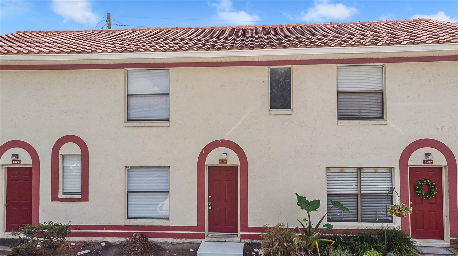 Perfect for investors, first-time homebuyers, or owner-occupants, this well-maintained 2-bedroom, 2.5-bath townhome in the gated community of Hidden Creek offers comfort, convenience, and excellent value. The two-story layout features two spacious master suites, tile flooring throughout, and a cozy dinette area that overlooks a private courtyard. Recent upgrades include a new tile roof (just 2 years old) and a new privacy fence (6 months old). The kitchen is equipped with stainless steel appliances, and the home includes plenty of storage along with two assigned parking spaces. Hidden Creek offers resort-style amenities such as two community pools, hot tubs, and a dog walk area. The low HOA fee covers roof maintenance, building insurance, lawn care, and exterior pest control. Ideally located near the University of Central Florida, Downtown Orlando, SR 528, SR 408, and SR 417, this property is a smart choice for those seeking a move-in-ready home or a great investment opportunity.