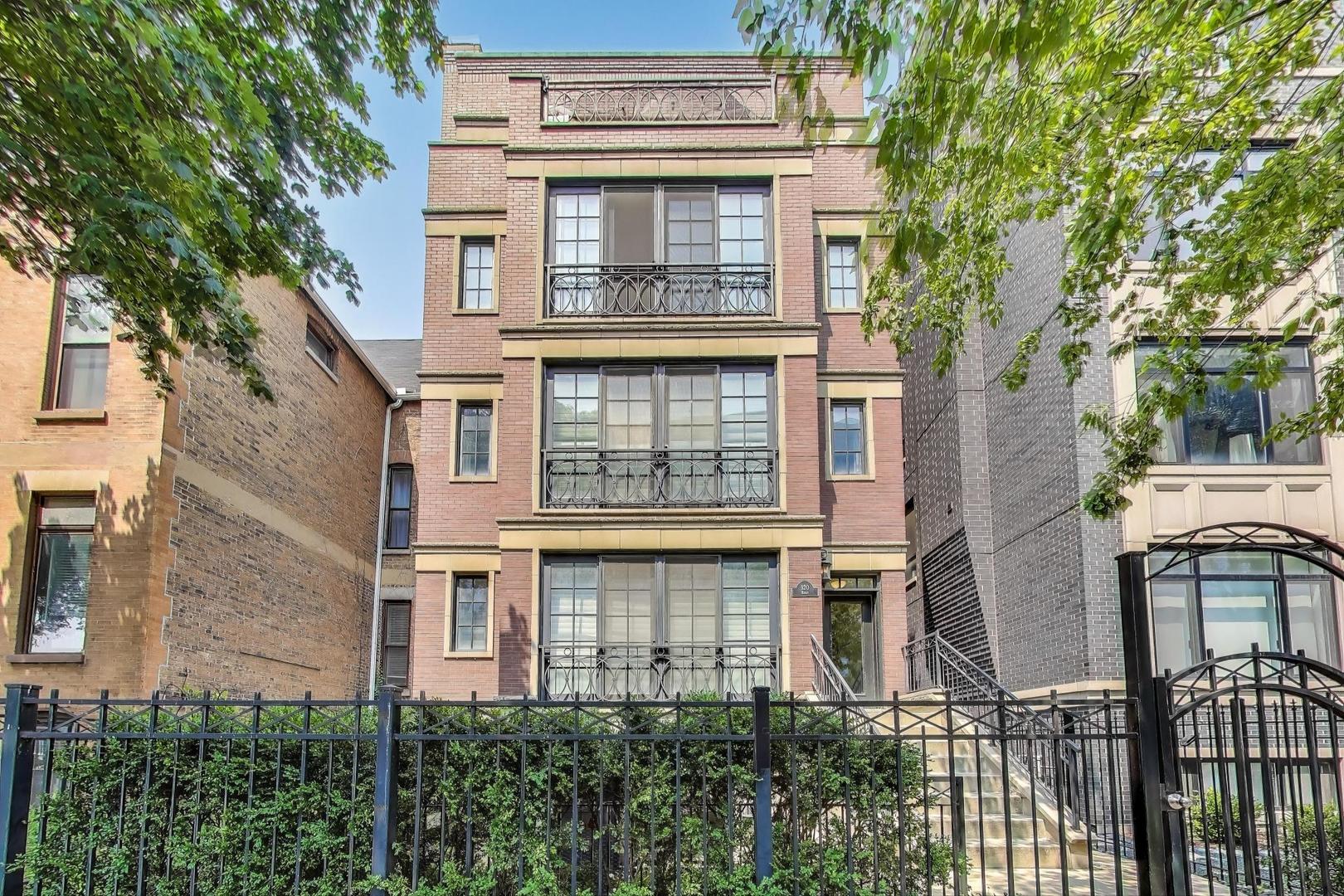 Luxurious and extremely well maintained 2BR/2BA condo in the perfect Lakeview location. This south facing extra-wide home boasts an open living/dining room, 10' ceilings, crown moldings and wired for sound sound. The incredible kitchen features a pantry, professional grade appliances by Subzero, Viking & Bosch, a wine fridge, granite counter tops, with an eat-in breakfast bar. The fantastic primary bedroom with not one, but TWO walk-in closets, can easily accommodate a king-sized bed. The natural stone en-suite bath which includes a giant walk-in steam shower with dual showerheads, and a double vanity. The spacious 2nd bedroom can easily fit a queen-sized bed and desk so you don't have to compromise on the work from home and guest space. The 2nd bathroom is nicely appointed with natural stone. With highlights like the large 12' x 11' front patio with gas line that's pefect for outdoor dining, high efficiency front loading washer & dryer, cozy fireplace, organized closets, additional storage and one dedicated parking space on the heated driveway, it'll surely make you stop looking as you've finally found THE ONE. Phenomenal location that's steps some of the city's best restaurants, shopping, nightlife, grocery stores, theaters, parks, lakefront and CTA El (both Red & Brown line), & buses.