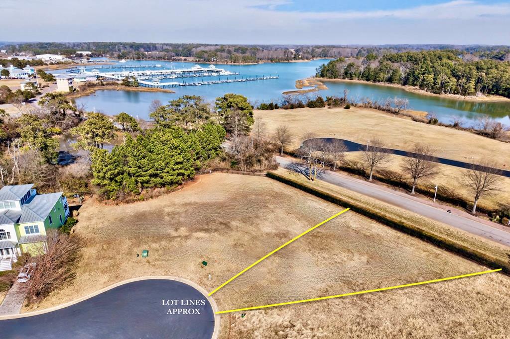 Homesite Lot 151 located in the Kings Bay Village section of Bay Creek. There is no required timeframe to build, giving you flexibility to design your dream home when you're ready. Property owners enjoy access to a beautiful private beach along the Chesapeake Bay. Kings Bay Village is located a golf cart ride away from  Historic Cape Charles, you'll love the boutique shopping, local dining, marinas, and year-round events. Now is a wonderful time to secure your coastal homesite!