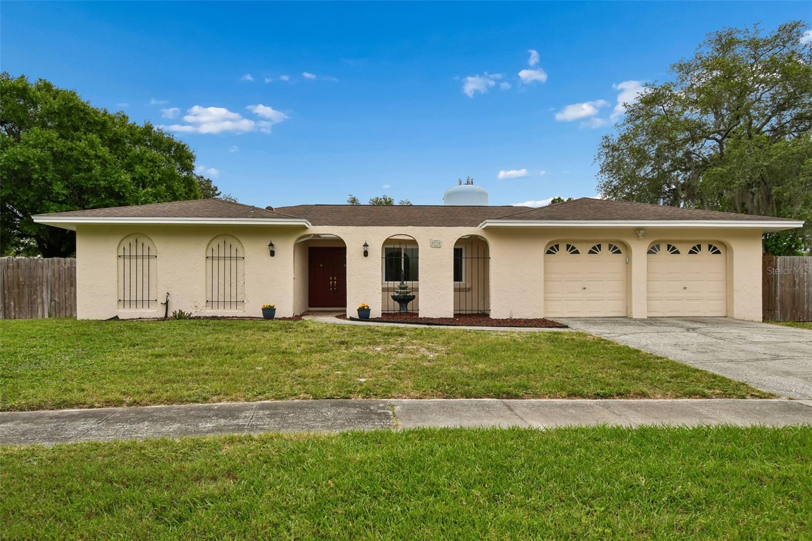 Nestled in on a quiet cul-de-sac in the highly desired neighborhood of Dr Phillips sits this remarkable, fit most situations home, ready for new owners. If you are seeing this you already know how wonderful the area is with schools, businesses, and attractions all within minutes of this home. This one story home boasts a huge privacy fenced yard that’s about 1/3 acre. The split floor plan offers lots of living space with storage abundance. Much of the home has been updated over recent years to include: *Flooring 2025, *Exterior paint 2025, *Kitchen 2021, *Re-plumbed 2018, *Roof 2018, *Most windows 2016, *Water Heater 2016, Tuff Shed 2019. Come see this easy to view property today!