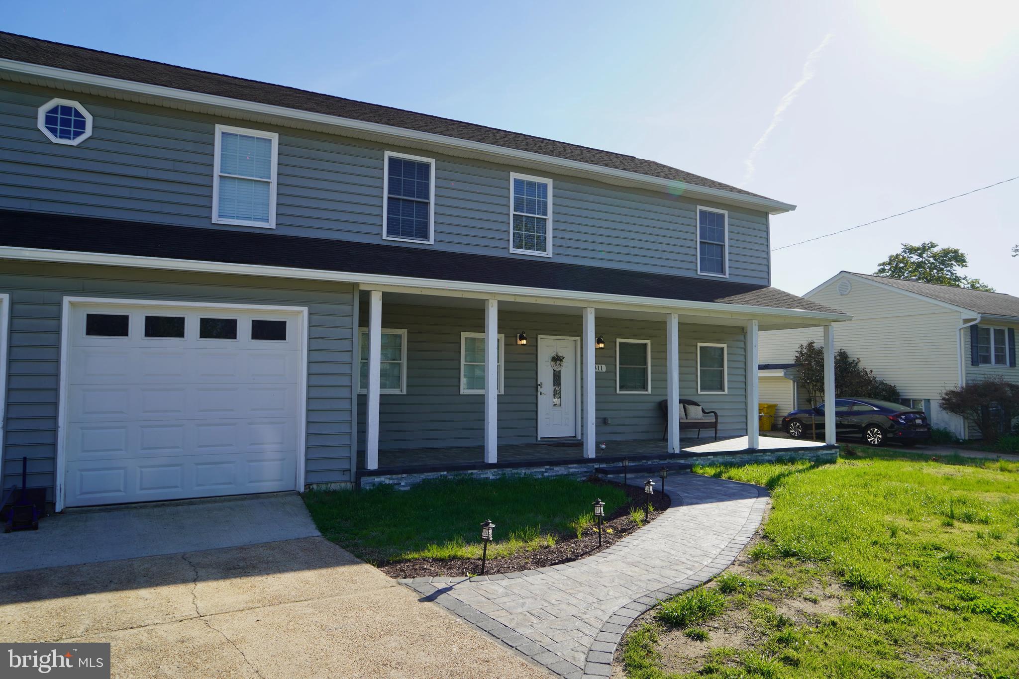 Welcome home! This beautifully updated residence offers 4 spacious bedrooms and 3.5 baths, thoughtfully renovated in 2018 to blend modern style with everyday comfort. From the moment you step inside, you’ll be impressed by the gleaming floors and open-concept layout, perfect for effortless living and entertaining.The gourmet kitchen serves as the heart of the home, featuring stainless steel appliances, granite countertops, elegant 52-inch cabinetry with ample storage, and a convenient breakfast bar—ideal for casual dining or hosting guests. Just off the kitchen, you’ll find a well-appointed half bath and direct access to the oversized two-car garage. The owners have recently upgraded the home with brand-new hardwood flooring throughout the main level and replaced all carpeting.Step outside to the expansive, freshly stained deck—perfect for relaxing or entertaining throughout the spring and summer months. Also, a brand new stone tile front porch. brand new stone work walkway from the driveway to the front door. Upstairs, you’ll find four generously sized bedrooms, including a luxurious primary suite with dual closets and a spa-inspired ensuite bath featuring a soaking tub and separate shower. A large guest bathroom with double vanities and a spacious laundry room add both comfort and convenience.The fully finished lower level offers incredible flexibility, complete with a full bath, walk-in shower and ideal for a recreation room, home office, guest space, or in-law suite with a lot of storage space as well, and walkout to the backyard—Freshly custom-painted throughout and truly move-in ready, this home offers the perfect combination of style, space, and functionality. Don’t miss the opportunity to make it yours!