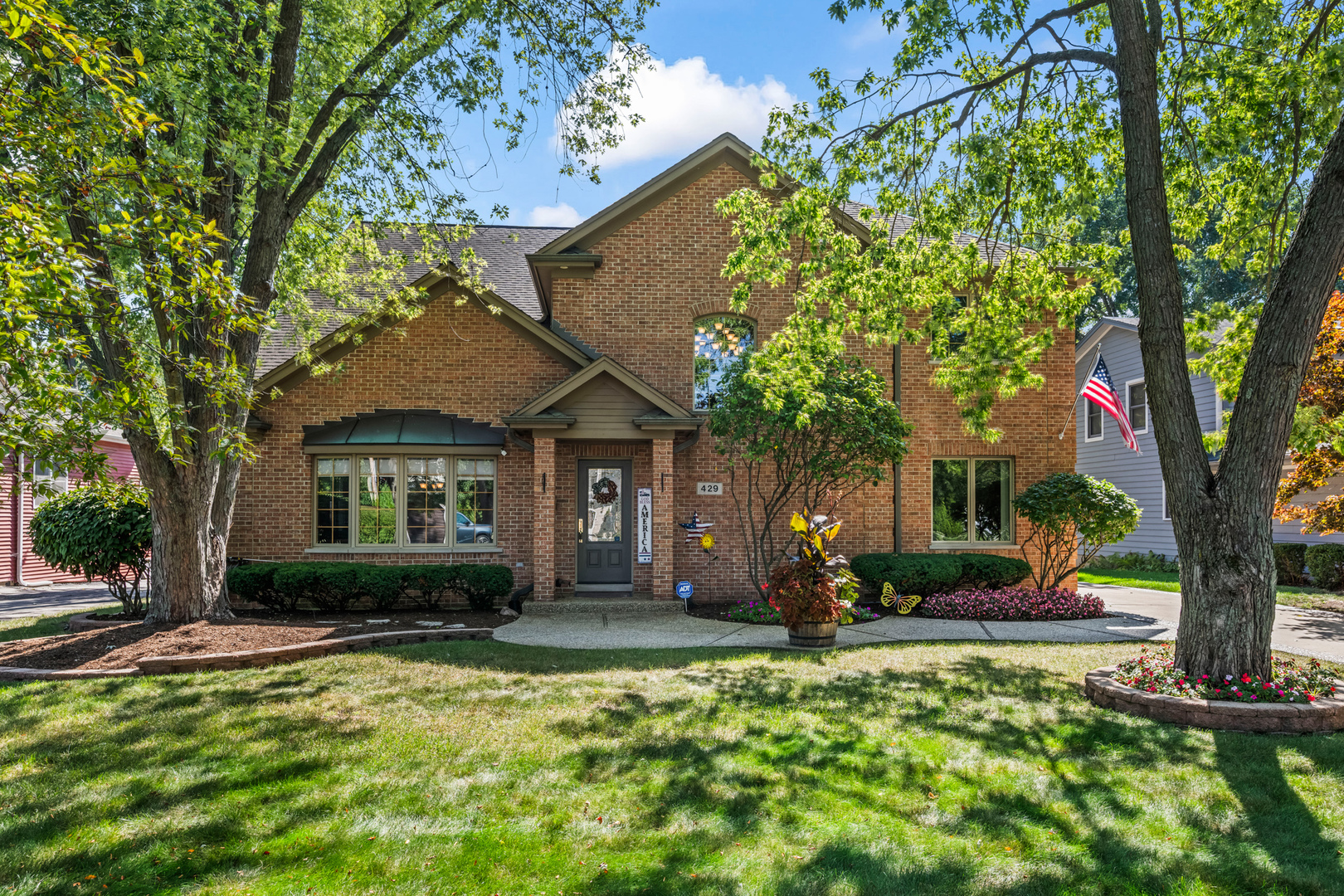 This beautiful custom-built brick home is perfectly situated in one of the area's most highly desired neighborhoods. Thoughtfully designed with a fantastic open floor plan, this home boasts soaring vaulted ceilings and spacious living areas ideal for both entertaining and everyday living. The heart of the home is a gourmet kitchen featuring an abundance of handcrafted cabinetry, granite countertops, stainless steel appliance package, and a large center island-perfect for gathering with family and friends. The adjoining family room is warm and inviting, centered around a striking stacked-stone fireplace. This home offers versatility with a convenient first-floor bedroom and full bath, along with a dedicated home office. Upstairs, the sprawling primary suite is a true retreat, complete with an oversized walk-in closet and a luxurious spa-like bath. The finished basement expands your living space with a spacious recreation room, full bath, and ample storage. Additional features include a massive three-car garage, a large deck for outdoor entertaining, and professionally landscaped grounds on a generous lot. Don't miss this rare opportunity to own a truly exceptional home just minutes from award-winning schools, parks, shopping, transportation, and so much more!