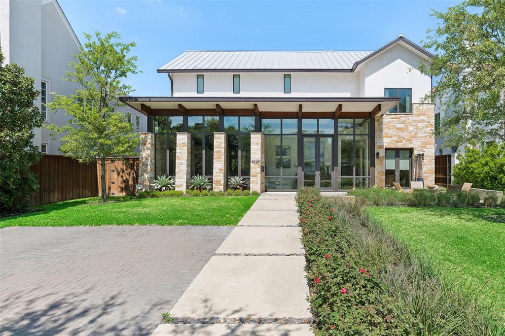 4028 Marquette Street - University Park contemporary luxury home in HPISD, zoned to Hyer Elementary, on an oversized 72x167 lot with pool and outdoor living.This striking 6,143-square-foot residence blends refined architecture, energy efficiency, and everyday functionality. Sleek lines softened by warm Austin stone create a sophisticated exterior, while expansive windows and sliding glass doors fill the home with natural light and provide a seamless indoor-outdoor connection.The first level features two spacious living areas, formal dining, and a private office, anchored by a chef’s kitchen with Sub-Zero, Wolf, and Bosch appliances. A temperature-controlled wine display serves as a focal point, enhancing the home’s entertaining appeal.The second level offers well-appointed secondary bedrooms with ensuite baths and a conveniently located laundry room. The primary suite is privately positioned, creating a peaceful retreat.The third level provides flexible living space, currently utilized as a golf simulator room with a full bath—easily adaptable to a media room, game room, or fitness space.Premium finishes throughout include limestone and marble surfaces paired with oak hardwood flooring, creating a timeless yet contemporary aesthetic. The home is projected to achieve approximately 28% greater energy performance than Energy Star and University Park code requirements.Outdoor living is equally impressive, with a covered patio, outdoor kitchen, resort-style pool, and private backyard. A three-car attached garage adds convenience.Located in the heart of University Park, this home offers a rare opportunity to own a modern luxury property in one of Dallas’ most prestigious neighborhoods.