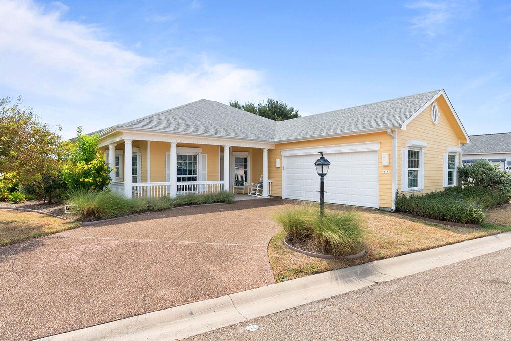Discover coastal living at its best in this charming three-bedroom, two-bath home located in the sought-after waterfront, gated community of Heron's Roost. Designed and positioned to capture amazing forever water views, the home features picturesque windows and cozy outdoor seating areas where you can relax and admire the breathtaking sunrises and views of Aransas Bay. The inviting open-concept layout boasts high ceilings, stylish vinyl plank flooring throughout, and a chef's delight kitchen with modern appointed updates. The private primary suite offers a beautifully remodeled bathroom and private access to the water-view patio, while the home also includes new windows, AC, hot water heater, whole-home generator, and the convenience of roll-down storm shutters. Step outside to relax and enjoy the fabulous front covered patio, and newly rebuilt community pier plus the fenced green space for the kiddos and pups to play just steps away. Perfectly maintained and move-in ready, this home offers the rare combination of privacy, convenience, and stunning coastal charm—don't miss your chance to make it yours!