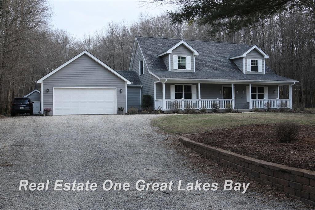 This one is worth a look! Situated on 15.06 acres of beautiful wooded acres, this property offers the kind of privacy and peaceful setting that is getting harder to find. Built in 2006, the home features 3 bedrooms, 4 full bathrooms, and a finished basement with the potential for a 4th bedroom.   Outside, there's plenty more to love too! A newer composite deck, above ground pool, pole barn, shed, and a 2.5 car garage to name a few perks. Big ticket items have already been taken care of for your peace of mind, such as a new septic tank in 2026 and a new sump pump in 2026, as well. A great opportunity for anyone looking to spread out and enjoy country living!   (more & updated Photos to come in a few days-Stay tuned ! )