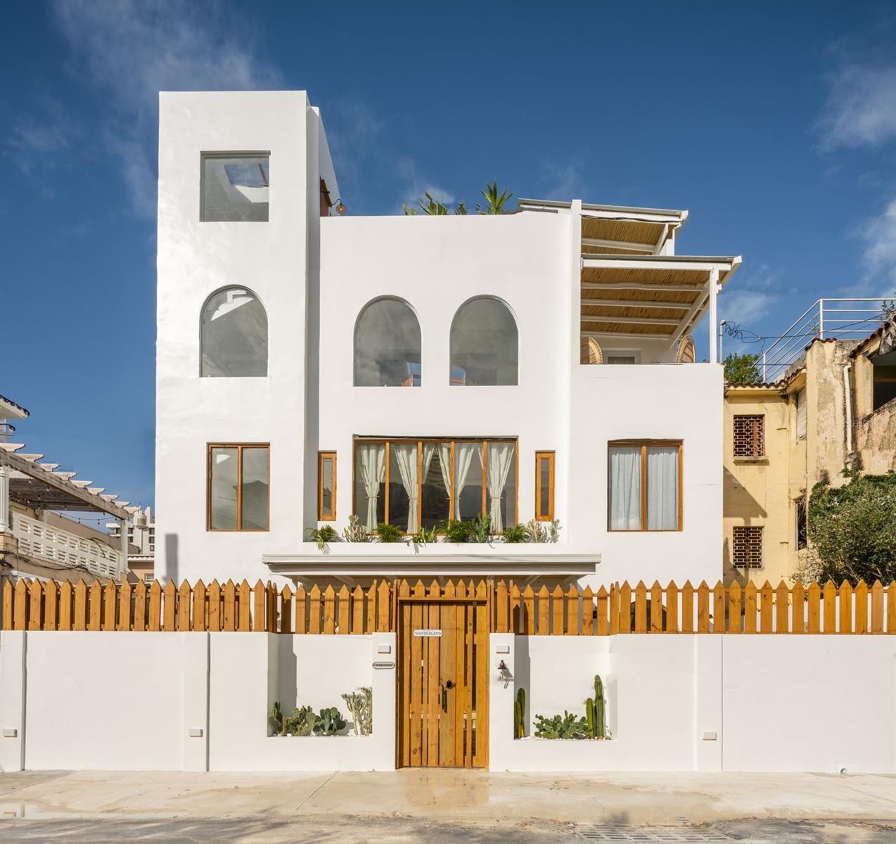 Located in the heart of Condado, San Juan, just steps from the beach, this beautifully curated residence offers a rare combination of space, versatility, and design. The property features a main house and a separate casita, thoughtfully decorated and designed to create a warm, inviting atmosphere with abundant natural light throughout.Spanning three levels, the home offers multiple gathering spaces perfect for entertaining family and friends, including a stunning kitchen, comfortable living areas, and well-appointed bedrooms and bathrooms. Additional highlights include a bar/lounge area and a rooftop terrace, ideal for enjoying the tropical breeze and vibrant surroundings.With over 5,000 square feet of living space, this property is not only perfect as a primary residence but also an excellent opportunity for short- or long-term rental income. Ideally located just a few blocks from two of Puerto Rico’s top private schools, as well as Condado’s best restaurants, shops, and amenities, this is a rare opportunity to own a truly versatile home in one of San Juan’s most desirable neighborhoods.