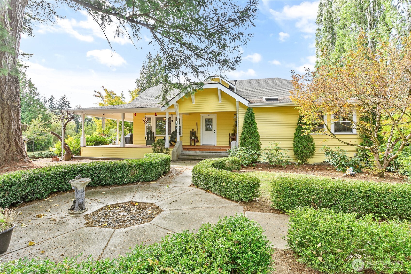 Lovingly updated craftsman cottage with all of the original character enhanced w/modern amenities on shy 5 acres of pastureland. Beautiful original fir flooring, crown molding, brick accents, decorative windows; updated w/newer roof, exterior paint, decking, furnace & more. Warm & cozy living room features newer pellet stove w/brick surround, arch opening to sunny hall, & lovely fir floors. Nice open kitchen w/tons of cabinets, eat-in island & inviting sunroom leading to huge partial wrap deck. Owner's suite w/sitting room, walk-in closet, tons of extra storage & huge updated full bath right next door feat. newer oversized spa tub & tiled shower. Large 2 car det garage w/separate flex room, green house, hot tub & acres for all your hobbies!