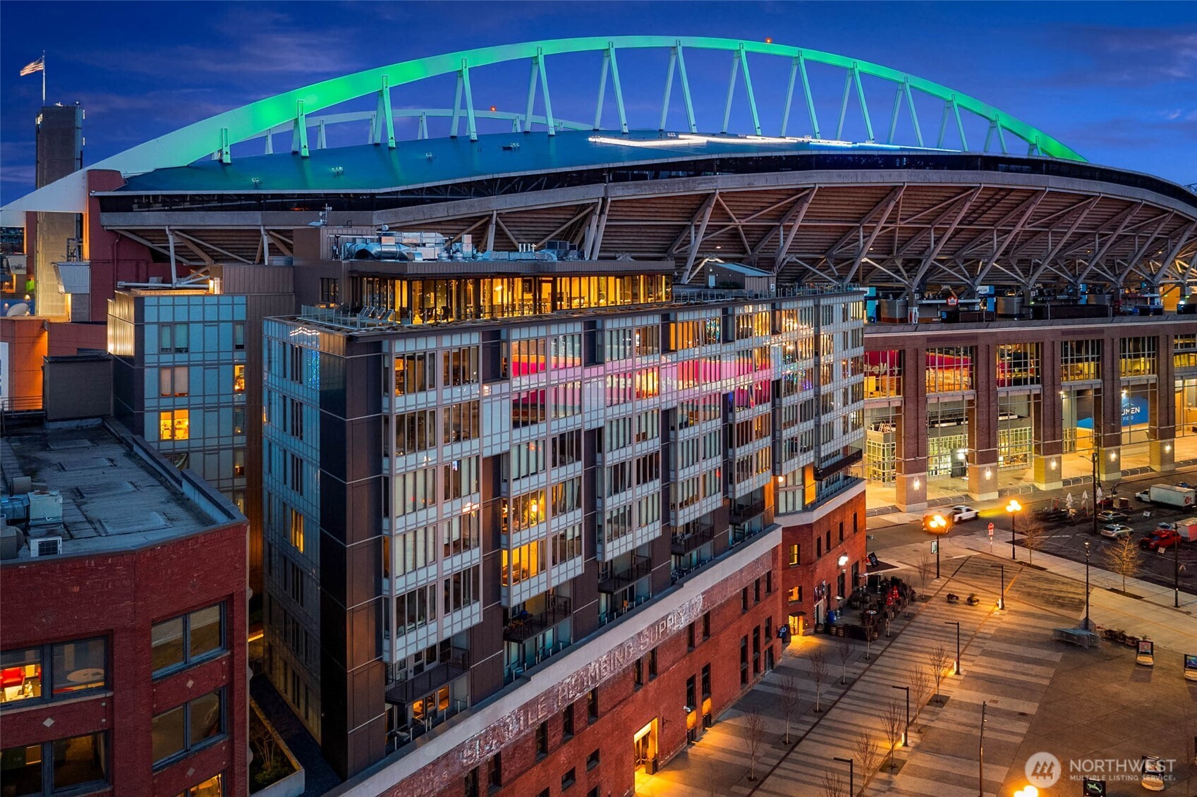 In a city that is constantly reinventing itself, Pioneer Square remains its heartbeat. Here, history isn’t just preserved; it’s lived. This isn’t just another condo; it’s a residence at the Gridiron-an architectural marvel of steel and glass rising seamlessly from a century-old historic brick podium. Step inside Unit #702 and leave the city’s vibrant energy at the door. This 7th-floor "junior one-bed" is a masterclass in urban efficiency and industrial elegance. Natural light pours through floor-to-ceiling windows, illuminating the rich hardwood floors and a chef’s kitchen that feels like a piece of furniture, with high-end appliances integrated into sleek custom cabinetry    Thoughtful Luxury by Design:    The Retreat: A strategic partial wall creates a private sleeping sanctuary without sacrificing the airy, open-concept flow of the home    The Wardrobe: While most urban studios compromise on space, this home features a massive walk-in closet with a custom-built organization system—a rare luxury for the minimalist at heart    The View: Watch the stadium district come alive or catch the glow of the Puget Sound from the wraparound rooftop terrace-the ultimate front-row seat to the PNW’s beauty    Your Neighborhood, Reimagined:  You are steps from the $2B+ Seattle Waterfront project, world-class art galleries, and the hidden cafes of the International District. Whether you’re catching a match at Lumen Field or hopping on a train at King St. Station, your lifestyle is supported