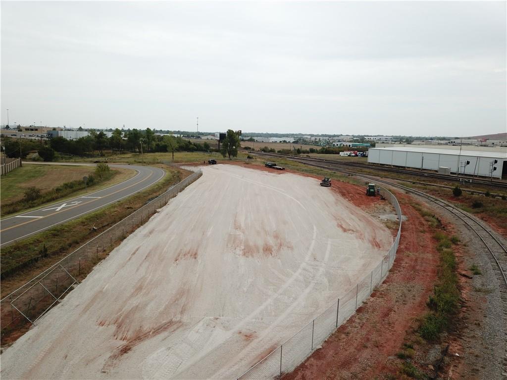 Lot is fences with two gates. One is automated and the other can be automated as well. Property is currently leased. Lot is set up nicely to accommodate several industrial buildings.  Seller is a licensed real estate broker #161306