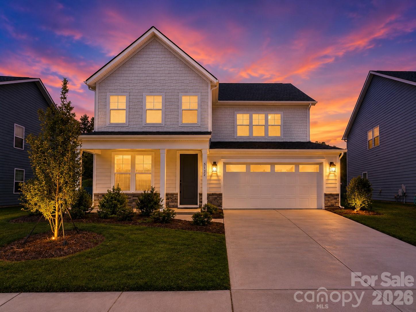 Nearly New Toll Brothers Luxury in Griffith LakesLight-filled, beautifully designed and barely lived in, this 2,838-square-foot Toll Brothers home delivers exceptional space, flexibility and refined living in the sought-after Griffith Lakes community.Step inside to an impressive open-concept main level, where an elegant tray ceiling creates a memorable entry and natural light fills the living, dining and kitchen spaces. Designed for effortless everyday living and entertaining, the main floor is also pre-wired for surround sound, adding another layer of convenience for future audio and entertainment.The heart of the home is the stunning kitchen, featuring beautiful cabinetry, quartz countertops, a large center island, generous workspace and a spacious walk-in pantry. Quartz finishes continue throughout the home, creating a beautifully cohesive and elevated look.Just off the garage, a dedicated flex/drop-zone area offers exciting potential for custom cabinetry, a mudroom-style landing space, beverage center or additional storage tailored to your lifestyle.A desirable main-level bedroom and full bath provide outstanding versatility for overnight guests, multigenerational living or a private home office.Upstairs, an expansive loft creates a true second living space with endless possibilities as a media lounge, game room, home theater, playroom or sophisticated retreat.The spacious primary suite feels like a private sanctuary, enhanced by an elegant tray ceiling, generously sized en-suite bath and the luxury of TWO separate walk-in closets. Two additional bedrooms with their own walk in closets, another full bath and a conveniently located second-floor laundry room complete the upper level.Outside, the possibilities are equally impressive. Set on approximately 0.17 acres, the large, level backyard backs to a private berm rather than another home, creating a wonderful sense of privacy and an incredible canvas for an outdoor kitchen, expanded entertaining space, gardens, firepit or personalized backyard oasis.Built in 2024 and exceptionally well maintained, this home offers the appeal of new construction without the wait, along with remaining transferable Toll Brothers builder warranty coverage, as applicable.Enjoy the complete Griffith Lakes lifestyle with lake access, miles of walking trails, a resort-style pool and cabanas, clubhouse, fitness facilities, pickleball and tennis courts, dog park, playground and inviting gathering spaces.And when it’s time to venture beyond the neighborhood, you’re conveniently located near shopping, dining, major interstate access and Charlotte Douglas International Airport, with Uptown Charlotte less than 15 minutes away.For buyers seeking the ultimate move-in-ready experience, an optional turnkey opportunity may also be available for an additional negotiated price.Nearly new. Beautifully open. Naturally bright. Exceptionally spacious. Ideally connected.Welcome home to 5132 Glenwalk Drive.