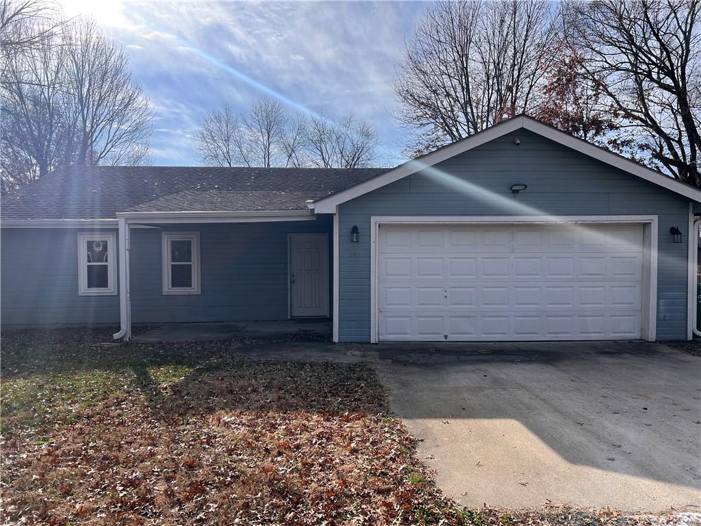 Welcome home to this charming 3 bedroom, 2 bath property in Adrian, MO. Featuring a generous family room with a wood-burning fireplace, this home offers a warm and inviting atmosphere. Built on a concrete slab with approximately 1,872 square feet of living space, the property also includes a built-in garage and a spacious backyard ideal for gatherings or quiet evenings. Convenient access to commuting routes and nearby amenities adds to the appeal.