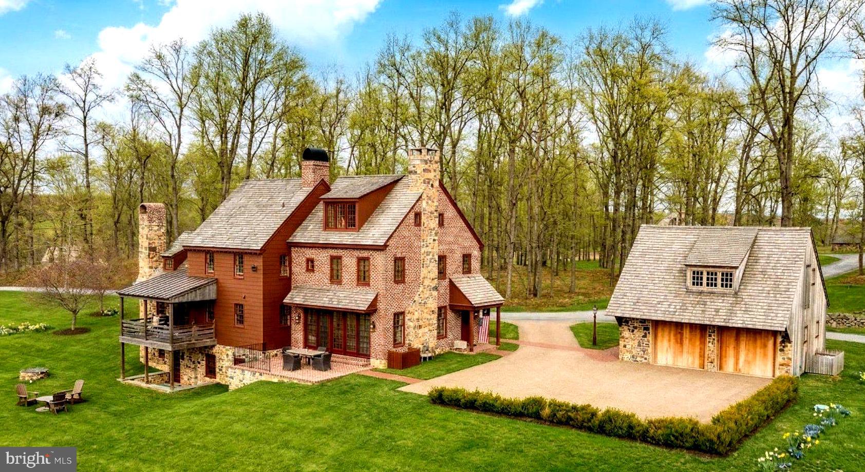 Set between the fairways of French Creek and close proximity to  Stonewall Golf Clubs, this custom-built Chester County residence pairs 18th-century architectural character with the ease of modern, low-maintenance living. Built in 2019 and thoughtfully updated in 2022, the home spans three finished levels with 5 bedrooms, 5 full baths, and nearly 4,000 square feet of total finished space — offering room to spread out without the upkeep of a sprawling estate.Wide-plank hardwood floors, hand-selected millwork, and three  fireplaces set a tone of warmth throughout. The kitchen — honed soapstone counters, a Lacanache range, and a butler's pantry — opens  to the living and dining rooms, creating an easy flow for everyday life and entertaining alike. A private main-level office with its  closet and Jack-and-Jill bath offers a genuine work-from-home setup, while the primary suite upstairs delivers a walk-in closet,  and a walk-in shower finished in natural stone. Two additional generously sized bedrooms, main hall bath with dual vanities, and a secret room under the stairs, complete the second level. The third floor offers yet another bedrooms (#4) or office/flex space, complete with full bathroom and views that will take your breath away.The fully finished lower level adds a family room with its own fireplace, a fifth bedroom, and a full bath — ideal for guests, multigenerational living, or additional flex space. Outside, a stone patio and covered deck look out over rolling, greens and protected open space, with a detached two-car garage and a stone driveway completing the picture.Perhaps most valuable: the HOA handles lawn care, snow removal, and trash, so ownership here means more time for golf, travel, and the Chester County lifestyle — and less time on maintenance.Offered at $1,995,000. Located in the award-winning Owen J Roberts School District.