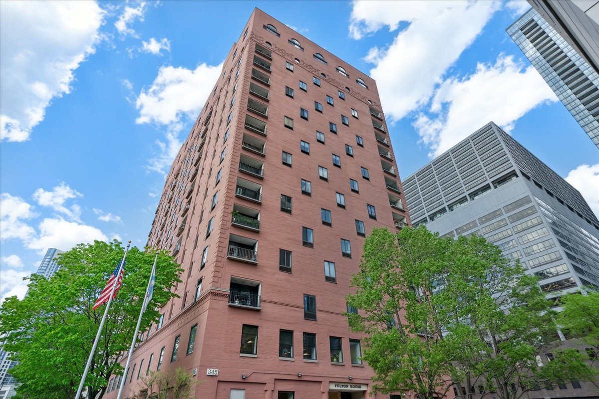 Stunning 2 Bed / 2 Bath SE Corner Unit with Best Views in the Building! Live on the river at historic Fulton House in this spacious 1,500 sq. ft. corner condo with barrel-vaulted ceilings, open floor plan, and tons of storage. Enjoy brand-new hardwood floors, a 2021 remodeled kitchen with stainless steel appliances, and a 2021 spa-like primary bath. Soak in skyline and river life from your private south-facing balcony, or relax on the building's riverside deck with BBQs and boat dock. Unbeatable location- near Fulton Market, River North, East Bank Club, Riverwalk, Union Station, and EL stops.