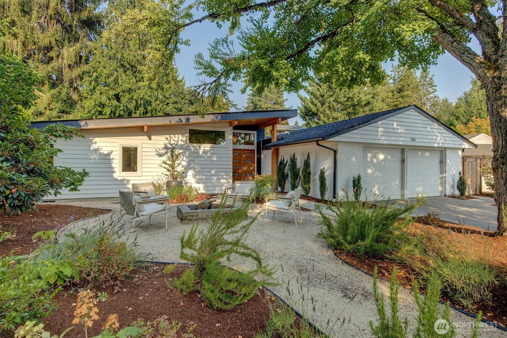 Welcome to this beautifully updated Tam O’Shanter rambler, where thoughtful design, flexible living & inviting outdoor spaces come together. Four bedrooms include two generous primary suites, each with an ensuite bath & walk-in closets, ideal for guests, multi-generational living or a private retreat. Two distinct living spaces offer room to spread out, while the kitchen sits at the center of the home, seamlessly connecting the living & dining areas and creating a natural gathering place. Marble counters & stylish finishes add to the appeal, while skylights & oversized windows fill the home with natural light. Charming brick fireplaces adds warmth & character.    Ideally situated on a quiet cul-de-sac, this home makes a memorable first impression with exceptional curb appeal. A crisp white exterior, black trim, warm wood accents & a welcoming front courtyard with fire pit create a striking arrival. The fully fenced, wraparound yard offers plenty of room to enjoy the outdoors, including a private brick patio perfect for dining & entertaining. A two-car garage adds everyday convenience.    Enjoy the incredible Tam O’Shanter lifestyle with a neighborhood golf course, community pool & swim team, plus a park with tennis & pickleball courts, playground, playing field & basketball. All within an excellent school district & ideally located near commuter routes. A special combination of single-level living, beautifully updated spaces & a true sense of community.