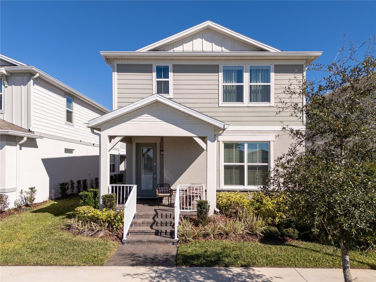 Built in 2023, this beautiful Juniper floor plan is located in the highly desirable, gated resort-style community of Isles of Lake Nona, offering serene water views and an exceptional Lake Nona lifestyle. Ideally positioned just minutes walking distance to Luminary Elementary and Middle school, also from Lake Nona Town Center, Medical City, and the USTA, this two-story home combines modern design, comfort, and convenience.The welcoming foyer opens to a private first-floor bedroom and full bathroom at the front of the home, showcasing peaceful water views—perfect for guests or a home office. The open-concept layout flows into the upgraded gourmet kitchen, complete with built-in appliances, quartz countertops, a large center island, pantry, and a spacious gathering room ideal for entertaining.Enjoy a covered lanai and a charming courtyard connecting the home to the rear-entry two-car garage. Recent enhancements include a privacy fence, low-maintenance synthetic grass, and a whole-home water filtration system, creating an inviting and functional outdoor space.Upstairs, you’ll find a versatile loft, a generous owner’s suite with en-suite bathroom and walk-in closet, two additional bedrooms sharing a full bath, and a conveniently located laundry room. All four bedrooms feature walk-in closets. Designer finishes throughout include white cabinetry, wood-look porcelain tile flooring, pendant lighting, window blinds, and a complete appliance package—including washer and dryer. The home is also pre-wired for Smart Home technology.The HOA provides exceptional value, covering landscaping for individual homes, internet service, gated access, and full use of the community’s resort-style amenities, including a clubhouse, fitness center, pool with splash pad, playgrounds, and basketball, tennis, and pickleball courts. Easy access to SR-417 allows for a quick commute to downtown Orlando, Disney, and Florida’s beaches.Experience modern living with resort-style comfort—this Lake Nona home is ready to impress.