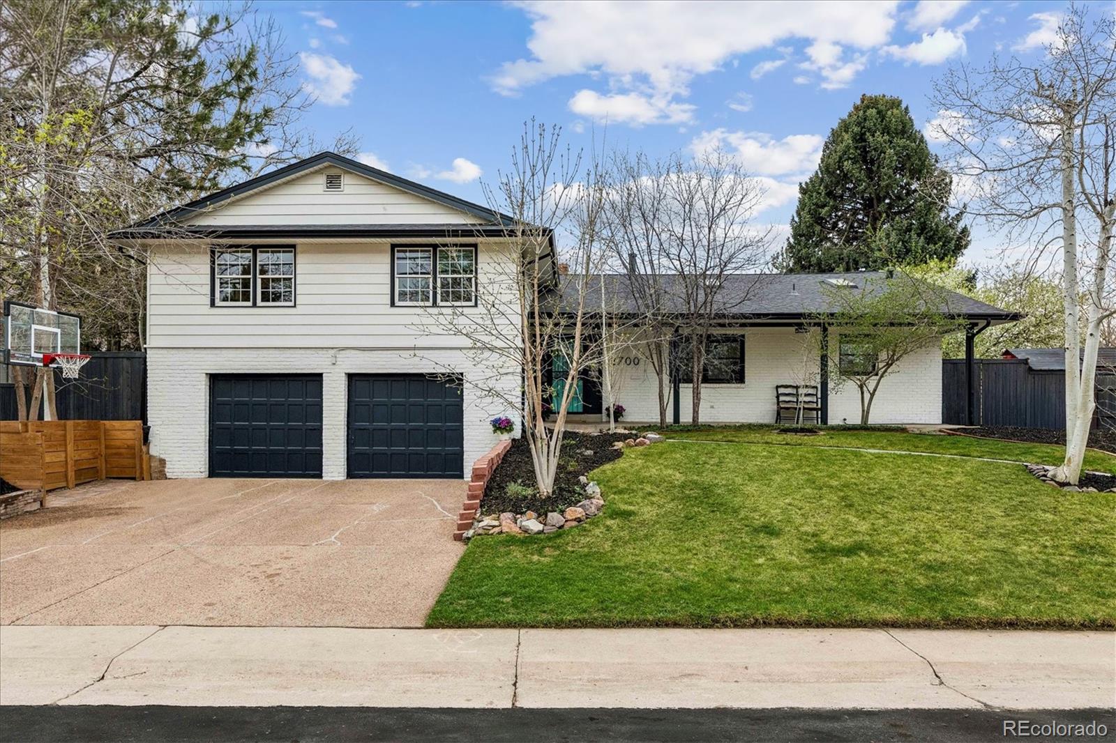 Perched on a gentle hill in one of Denver’s most sought-after neighborhoods, this light-filled four-level home offers the perfect blend of elegance, comfort, and everyday livability. With 6 bedrooms and 5 bathrooms, it’s thoughtfully designed to grow with you—truly a forever home that adapts to every stage of life.Set on a spacious corner lot, the property offers a tranquil, serene feel within a premium urban zip code. It’s a rare gem with unrivaled access: a large home, outdoor oasis, established community, and four houses from an award-winning K–8 school—all without the headache of morning traffic jams.From the moment you arrive, the inviting front porch sets a warm, social tone. The heart of the home is a massive kitchen that anchors daily life and effortless entertaining as it is designed for both function and gathering. Featuring two generous pantries, abundant cabinetry, and extensive counter space, there’s a place for everything. An oversized eating area easily accommodates a large table, with adjacent counter seating. Just steps away, garden beds offer fresh herbs &  produce at your fingertips. There is abundant storage on all four levels that ensures everything stays organized and guest-ready.Step outside to your own private backyard sanctuary—an entertainer’s dream.  Enjoy the sparkling pool, attached hot tub, built-in outdoor kitchen and grill, cozy fire pit, & a shaded pergola for dining and relaxing under the Colorado sky. It’s a staycation lifestyle—no travel required. From twilight lawn games to summer pool and hot tub days, outdoor living is redefined here.Perfectly situated in a true “heartbeat” location, you’re just minutes from everything: top-rated schools, grocery stores, medical facilities, shopping. Downtown Denver, The DTC & Red Rocks are a short drive away.This home offers the rare combination of space, style, location, & lifestyle—where everyday living feels extraordinary.