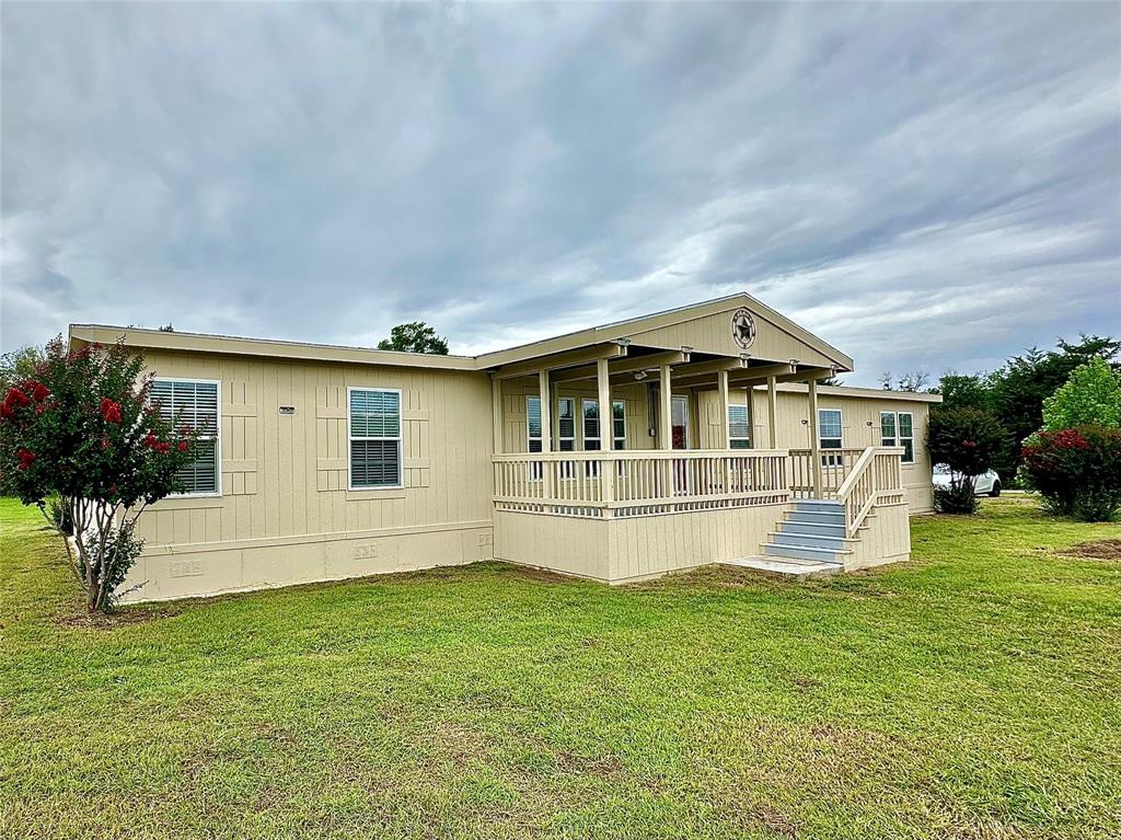 Location, location! Nestled in the highly sought-after city of Lucas just off the Country road, this beautiful oasis offers the perfect blend of tranquility and convenience, only 3 minutes from Lovejoy High School. Set on expansive, tree-filled acreage with no HOA, there's ample room for a shop, RV parking, greenhouse, and more. The well-kept doublewide home boasts a freshly updated interior with new paint and flooring, a bright, open layout flooded with natural light, and an impressive 6 bedrooms and 3 full baths—ideal for comfortable country living with room to grow.Owner need to use the back yard to do some farm work addition information can be giving after showing.