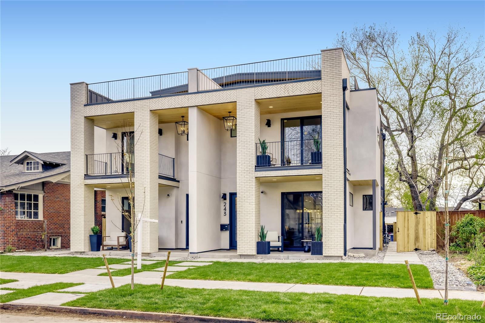 3 blocks to Washington Park. Nearly 4,000 sq ft, 2026 new build, 5 bed | 4.5 bath — wider and taller than anything in new construction today. ** Lower level with private exterior entrance [lock-off] **, extra-height 2-car garage + 1 parking pad, and large yard. 9.5' ceilings main level | 10' lower level | 9' primary suite.Main level delivers a wide great room with architectural fireplace, chef's kitchen with 9.5' quartz island, pot filler, professional range, paneled appliances, custom cabinetry, designer tile, and dedicated mudroom. Wide-plank hardwood throughout — including basement.Primary retreat features private balcony, custom built-in dressing closet, and spa 5-piece bath with LED lit make up mirrors. Top-floor bedroom with panoramic views. Loft with wet bar opens to a large rooftop deck with great views — one of the finest outdoor spaces in the neighborhood. Lower level is a true lock-off: private exterior entrance, 10' ceilings, wet bar, fireplace, family/theater room, ensuite bedroom with wardrobe, and dedicated laundry. Lives as a fully independent suite — ideal for multigenerational living, long-term guests, or added income flexibility.Dual HVAC | dual laundry | smart-home integration | built-in audio | security cameras | iPad control | extra-height 2-car garage | 1 parking pad | large yard. Built to Denver Energy Code. Walk to WashPark, neighborhood shops and Broadway. 5 min to Cherry Creek.