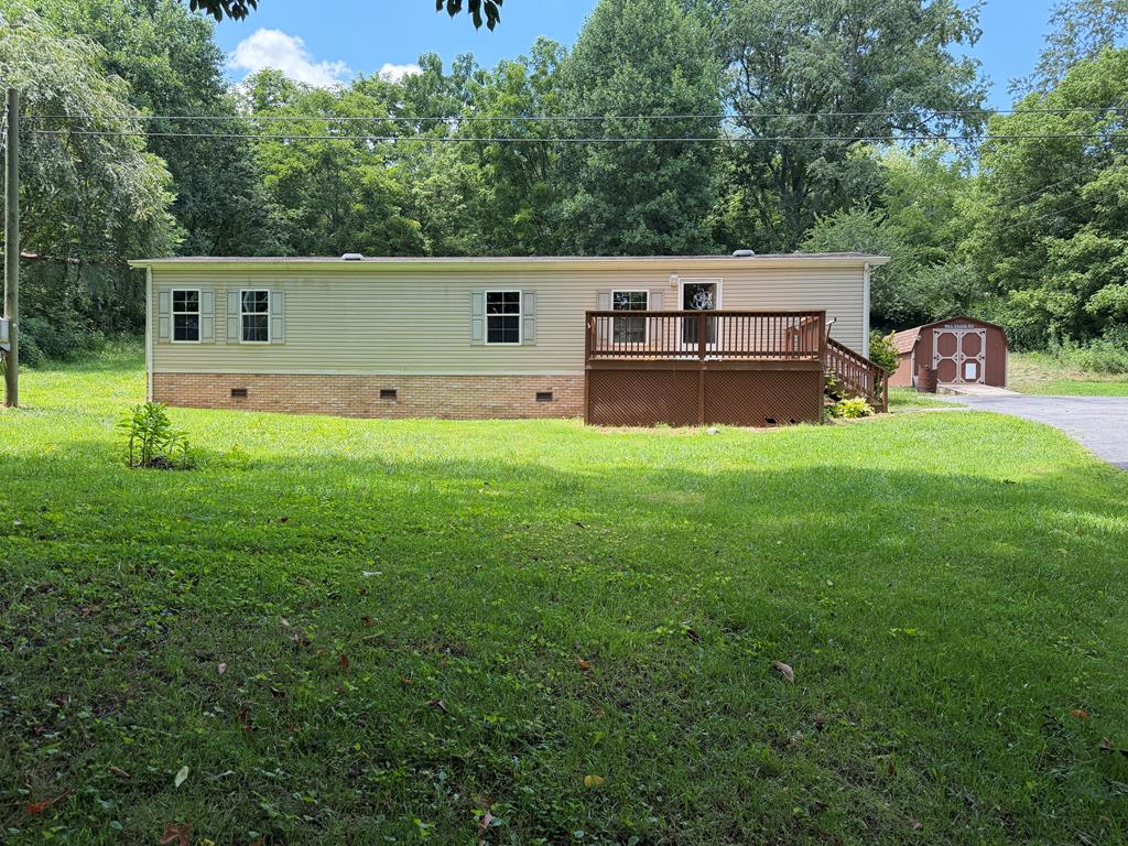 Priced to sell! Take a look at this clean, well maintained home on just over an acre, located only 15 minutes to Damascus (the "heart" of the Virginia Creeper Trail), 15 minutes to I-81, and minutes to the National Forest and Grayson Highlands State Park. Perfect for full time living, a vacation home, or as an investment property. New vinyl plank flooring in the living room and hallway. The stove, refrigerator, portable dishwasher, and Samsung washer and dryer (with steam setting), and propane tanks convey (appliances not warranted). Front and back decks. The storage shed and chicken coop convey. The property is about 50% cleared with woods for exploring along the back. You won't find another home as nice at this price!  This is a 2003 single wide on a permanent foundation. House is on piers. Buyer and its agent to determine Internet availability. Selling as-is, buyer to make no repairs. Inspections welcome. Offers must be accompanied by prove of funds/letter of prequalification. Note: PRN is 2419, here classified as the Book Page.