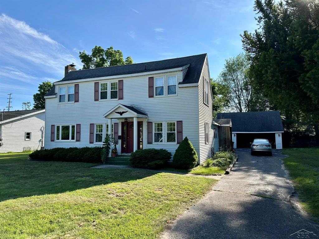 Within walking distance to downtown East Tawas - large home of over 1,900 sf with 4 bedrooms.  First floor bedroom, first floor full bath and first floor laundry, vinyl windows throughout.  Exterior includes a fenced back yard with wood deck, detached 2 car garage with loft and yard shed.  Book your showing today!