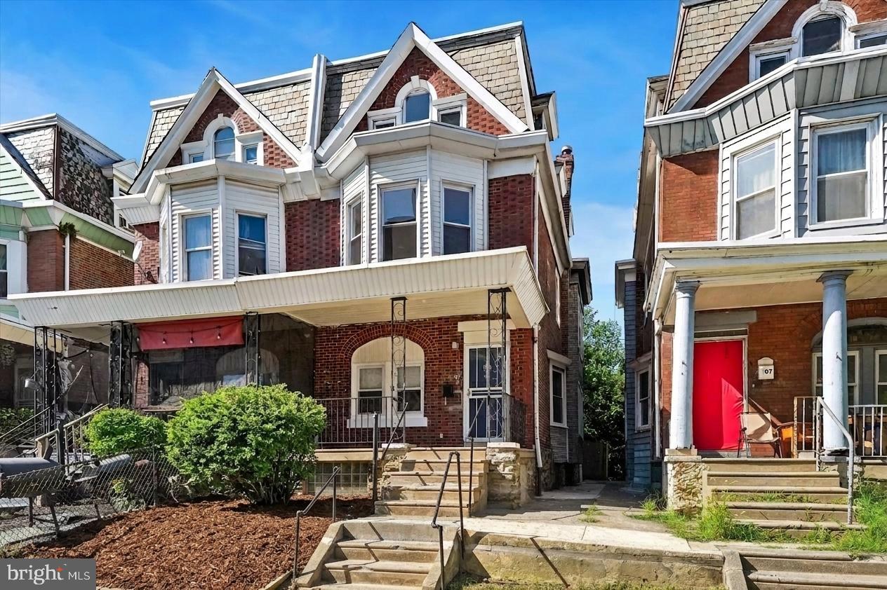 **WELCOME TO 909 E LINDLEY AVENUE**This large 3 story twin has been thoughtfully renovated while maintaining the original architecture and features we come to know and love in Philadelphia.  Situated on a wide avenue, you enter up to the home by your front lawn and classic front porch just awaiting your plants, chairs and landscaping.  Once inside you are welcomed by a big open living area with beautiful flooring throughout. The living area flows nicely to the formal dining room with room for a large seating arrangement and has a built in unit to add to the charm. Beyond the dining room is a true standout. The eat in kitchen is equipped with new cabinetry, new countertops with windows overlooking the yard area and a new stainless steel appliance package. As an added convenience the front loading washer and dryer set is tucked away in an alcove making daily life a breeze. Off the kitchen is a rear expansive fenced in green yard that is ready for you to set up a grill, table, planters and anything you envision.  Heading back inside the 2nd floor welcomes you to 3 true sized bedrooms and a modern hallway bath with new vanity, fixtures and shower/tub combo.  The 3rd floor is a true retreat with 2 large bedrooms, unique windows and loads of closet space. If you are looking for a truly beautiful, unique and spacious home, this is the one. Location, size and price can't be beat. The basement is very clean, painted and good for storage. Schedule your showing today, call for a private tour or join us at an upcoming open house.