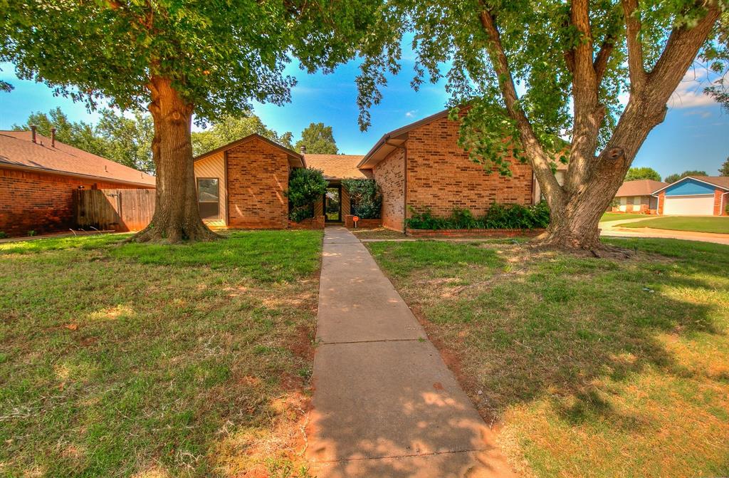 Come see this great home on a corner lot in an established Edmond neighborhood. This spacious home features brand new granite countertops, tile backsplash, and new carpet in bedrooms and living area. Enjoy the large fireplace, vaulted ceiling and built-ins in the living area, and the natural flow from living to dining to kitchen. Ample countertop and storage space in the kitchen as well as the laundry room. Mature trees in the front and backyard create a peaceful environment, while the large fenced yard provides privacy. Schedule your showing today. Owner licensee # 182797.