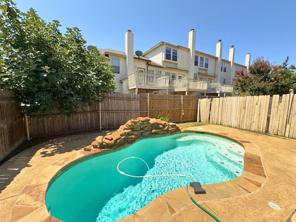 Rare find — private in-ground pool in a fenced backyard. Corner townhome, 1,599 sq ft, 3 bedrooms up including a spacious primary with garden tub. Granite kitchen with full stainless appliance package including refrigerator; full-size washer and dryer included. Wood-look flooring in main living areas, ceramic tile in kitchen and baths. Attached garage plus driveway parking. Central heat and air. Minutes to DFW Airport, SH-183, and SH-121. No pets. Available now.SUBMIT A RENTAL APPLICATION and READ RENTAL CRITERIA: Please see private remarks for more info about submitting a rental application and to read our rental criteria.