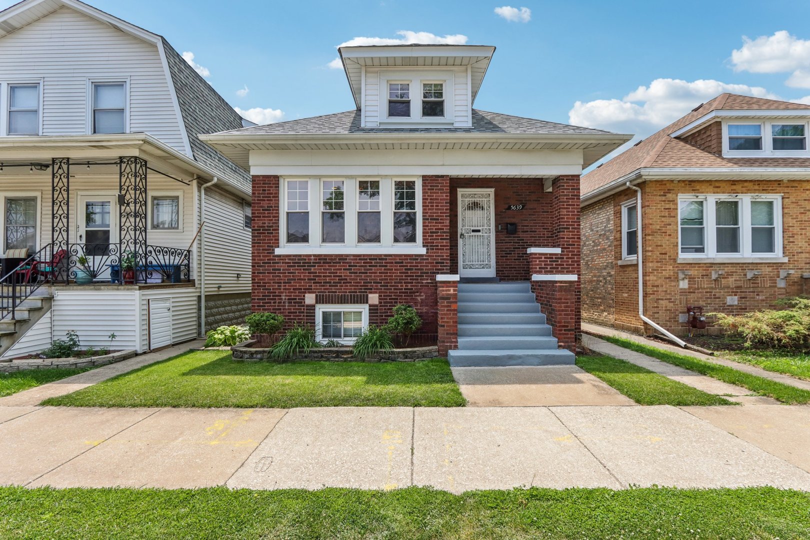Welcome to your New Home!! This stunning two-story brick residence is nestled in the heart of the Portage Park neighborhood, boasting of classic charm and modern updates. Step inside to discover a spacious living and dining area, ideal for entertaining family and friends. Updated Kitchen with granite counters and stainless steel appliances. Hardwood floors flow throughout the home, adding warmth and elegance. With creativity, there is room to add an extra bedroom. The massive primary suite is on the second floor, providing a true retreat, complete with a full bathroom, large closet space, and sitting area. Off your kitchen area, you have a lovely bonus room where you can step outside to a large deck, private yard space, and 2.5 car garage. Do not miss the finished basement area with a separate exterior access, which provides additional living space and investment potential featuring its own separate kitchen, dining, laundry, bedroom, and living room space. Natural light flows throughout this home, and it is move-in ready for the next owner. Furnace (2023) AC (2022)   Call today to see!!