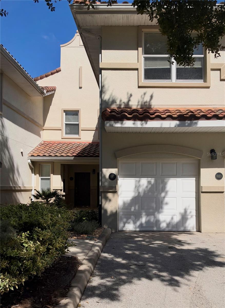 Well-maintained, two-story, 3-bedroom, 2.5-bath townhome style condominium with an attached one-car garage in the desirable gated Tidelands community. The first floor offers a spacious living room, dining area, breakfast nook, kitchen with granite countertops and stainless steel appliances, and a convenient half bath. All three bedrooms and two full bathrooms are located upstairs, providing privacy from the main living areas. Enjoy peaceful lake views and a natural setting from the covered, screened-in back porch. Recent updates include a new A/C in 2022 and water heater in 2024. Tidelands offers a resort-style lifestyle with 2 community pool, tennis courts, pickle ball, bike paths, walking paths, a community dock, and access to the Intracoastal Waterway. An excellent opportunity to enjoy low-maintenance coastal living in Palm Coast.